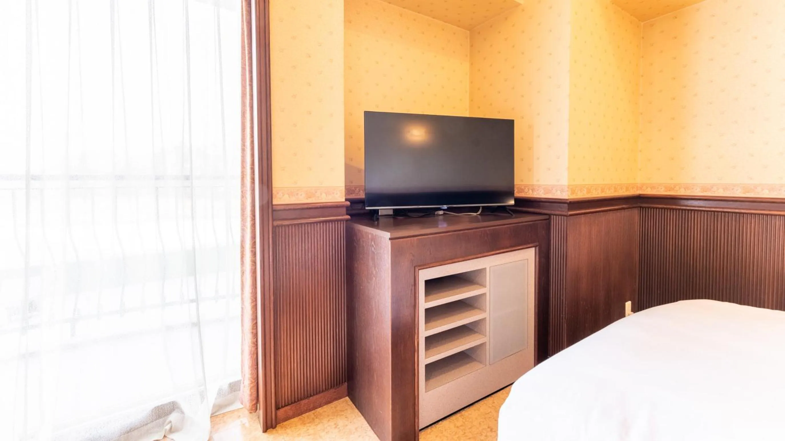 Bed in Tabist Shizukuishi Resort Hotel