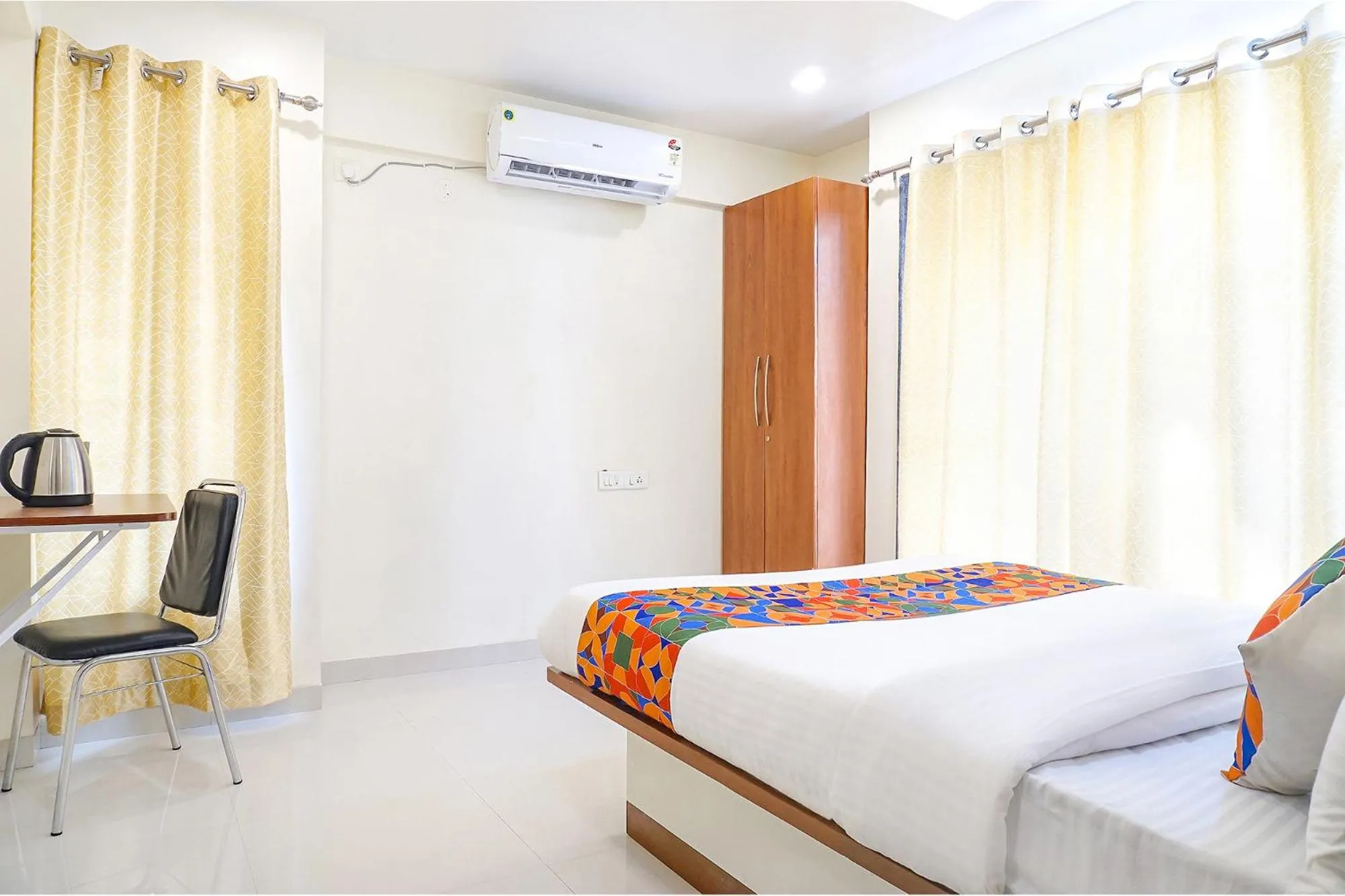 Bed in FabHotel Majestic Luxurious - Nr Rajaram Bhiku Pathare Stadium