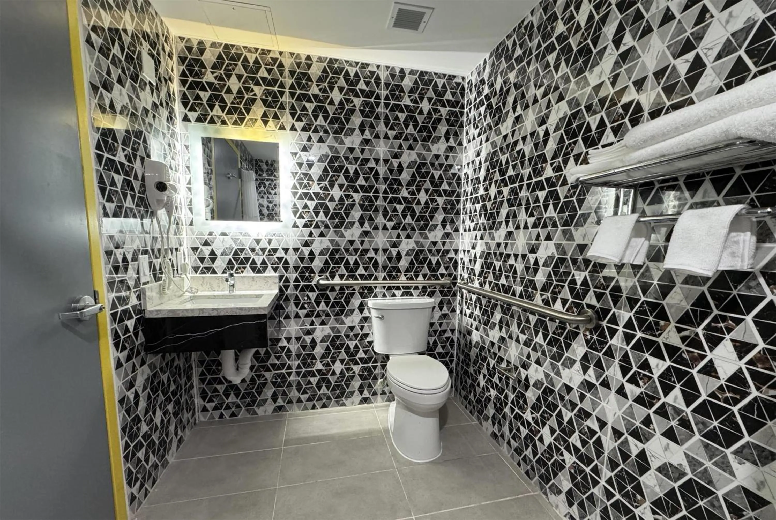 Bathroom in Days Inn by Wyndham New York Chinatown