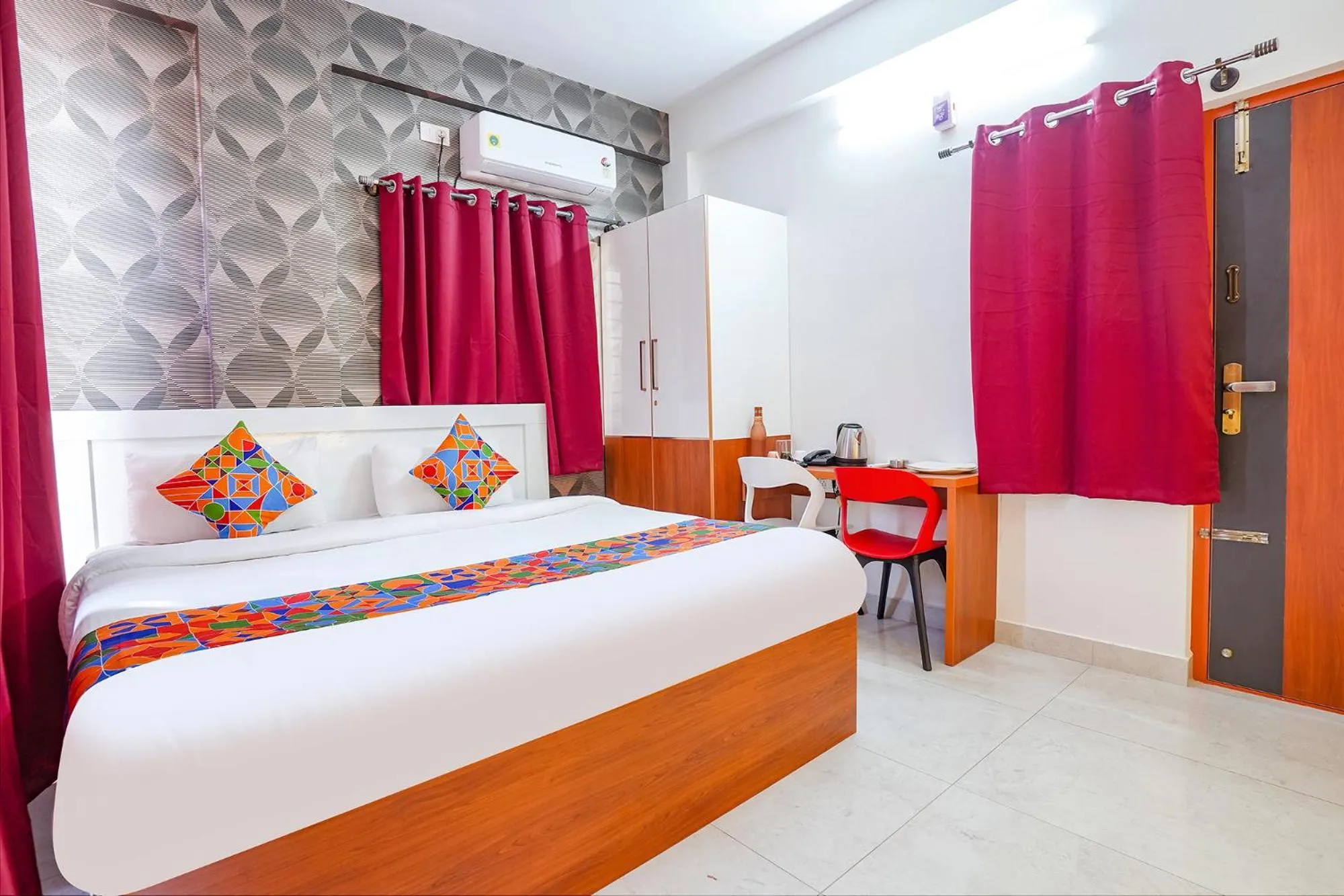 Bed in FabHotel Royal Platinum Suites