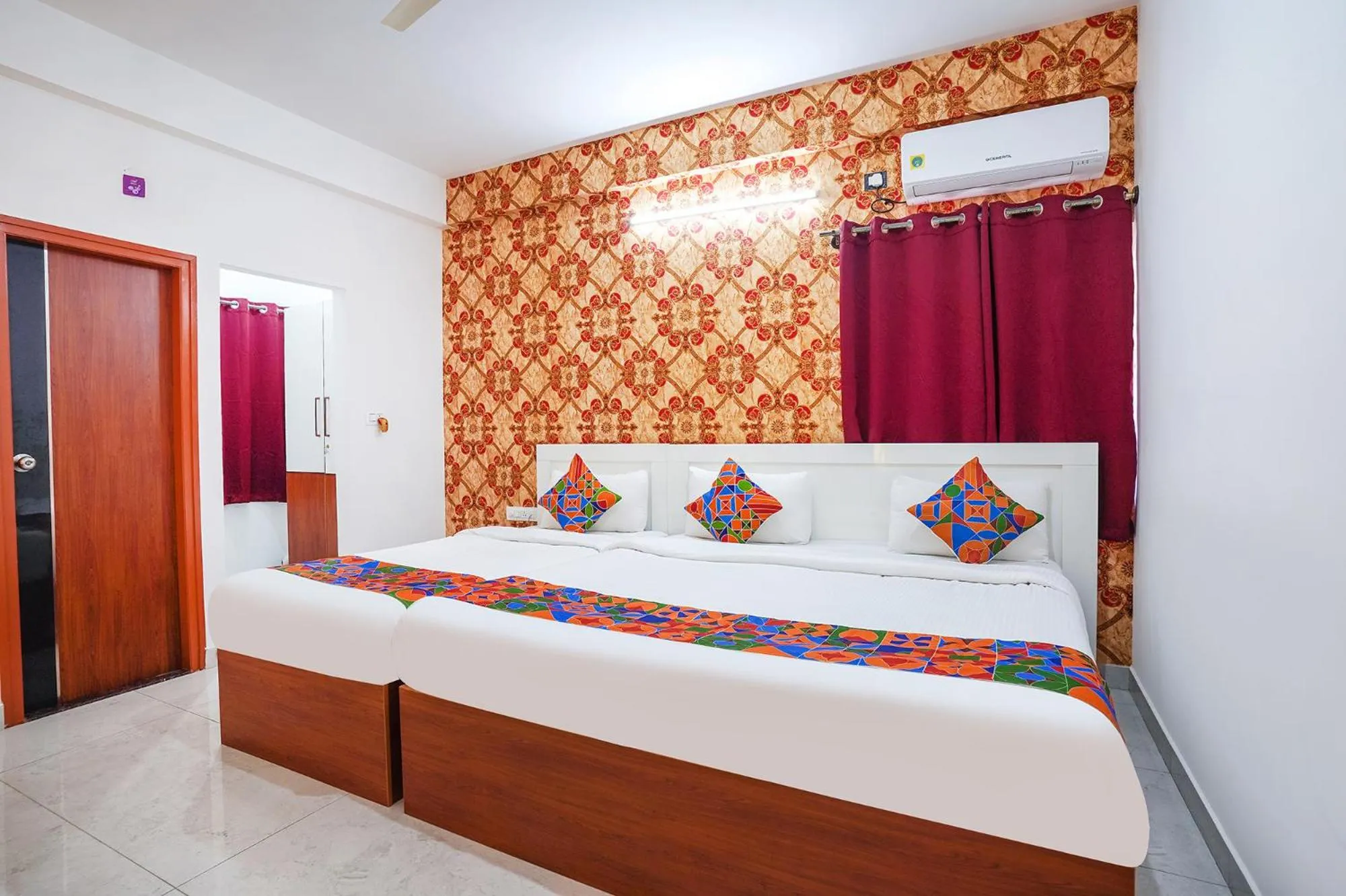 Bed in FabHotel Royal Platinum Suites