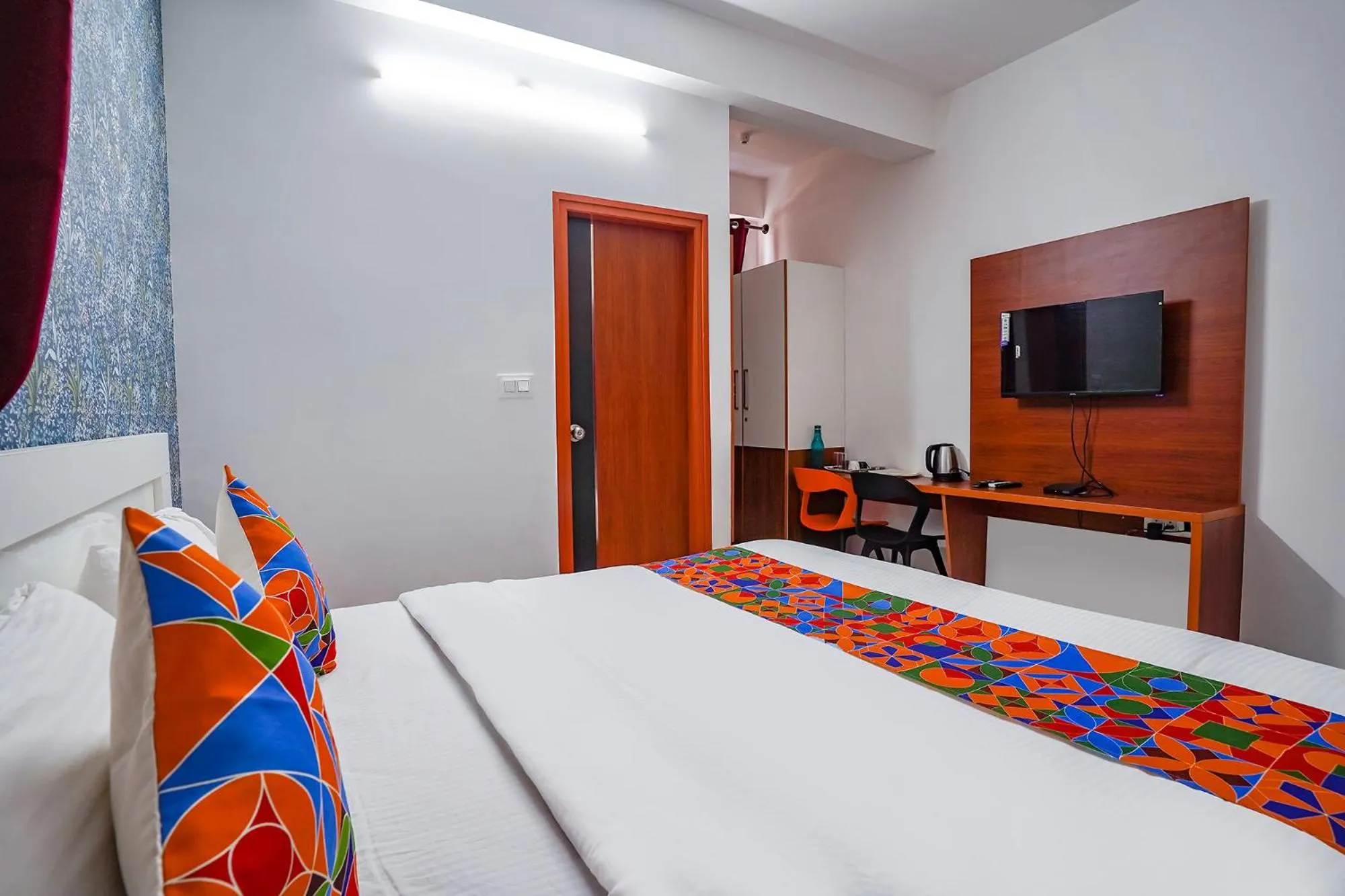 Bed in FabHotel Royal Platinum Suites