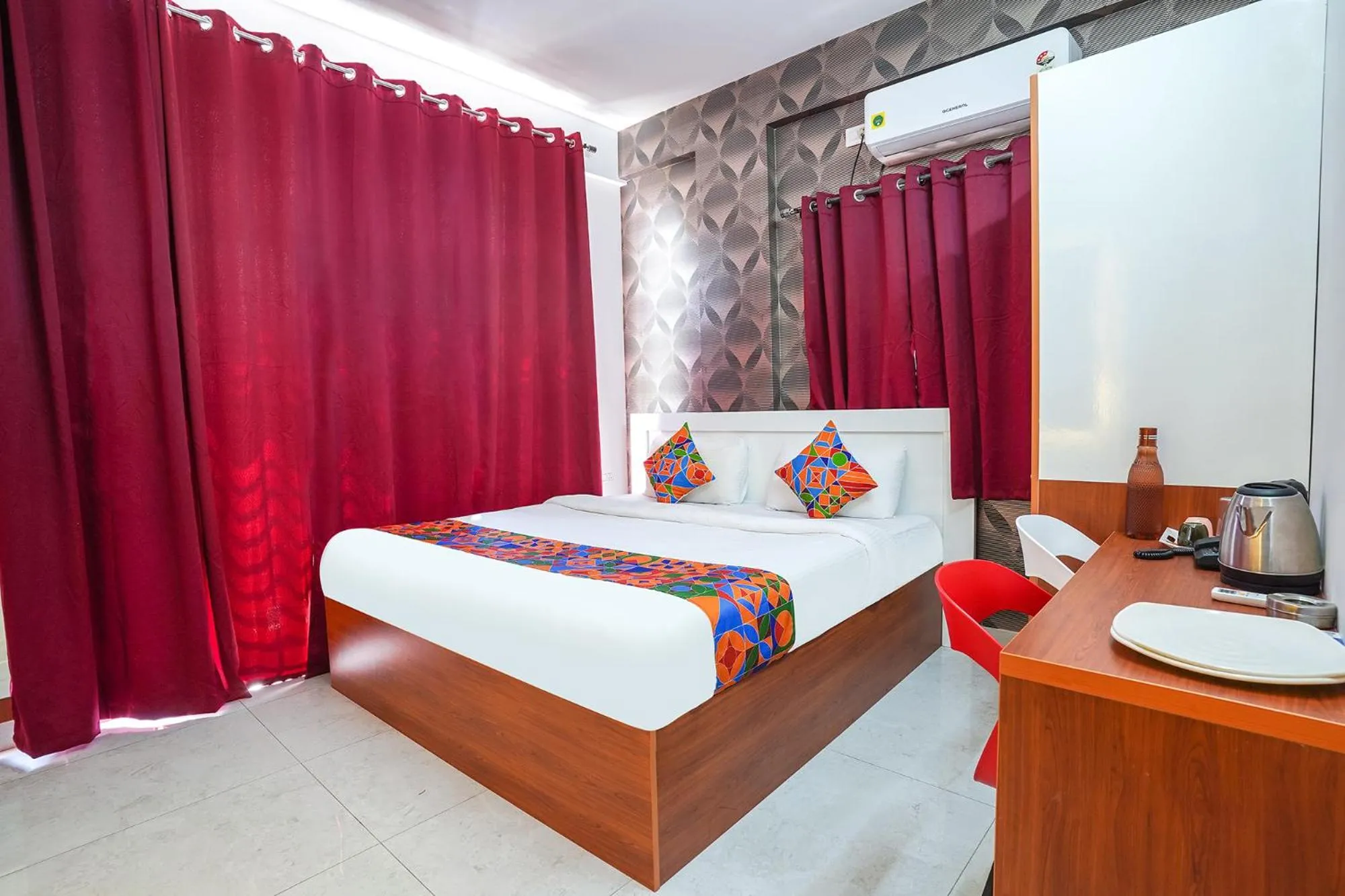 Bed in FabHotel Royal Platinum Suites