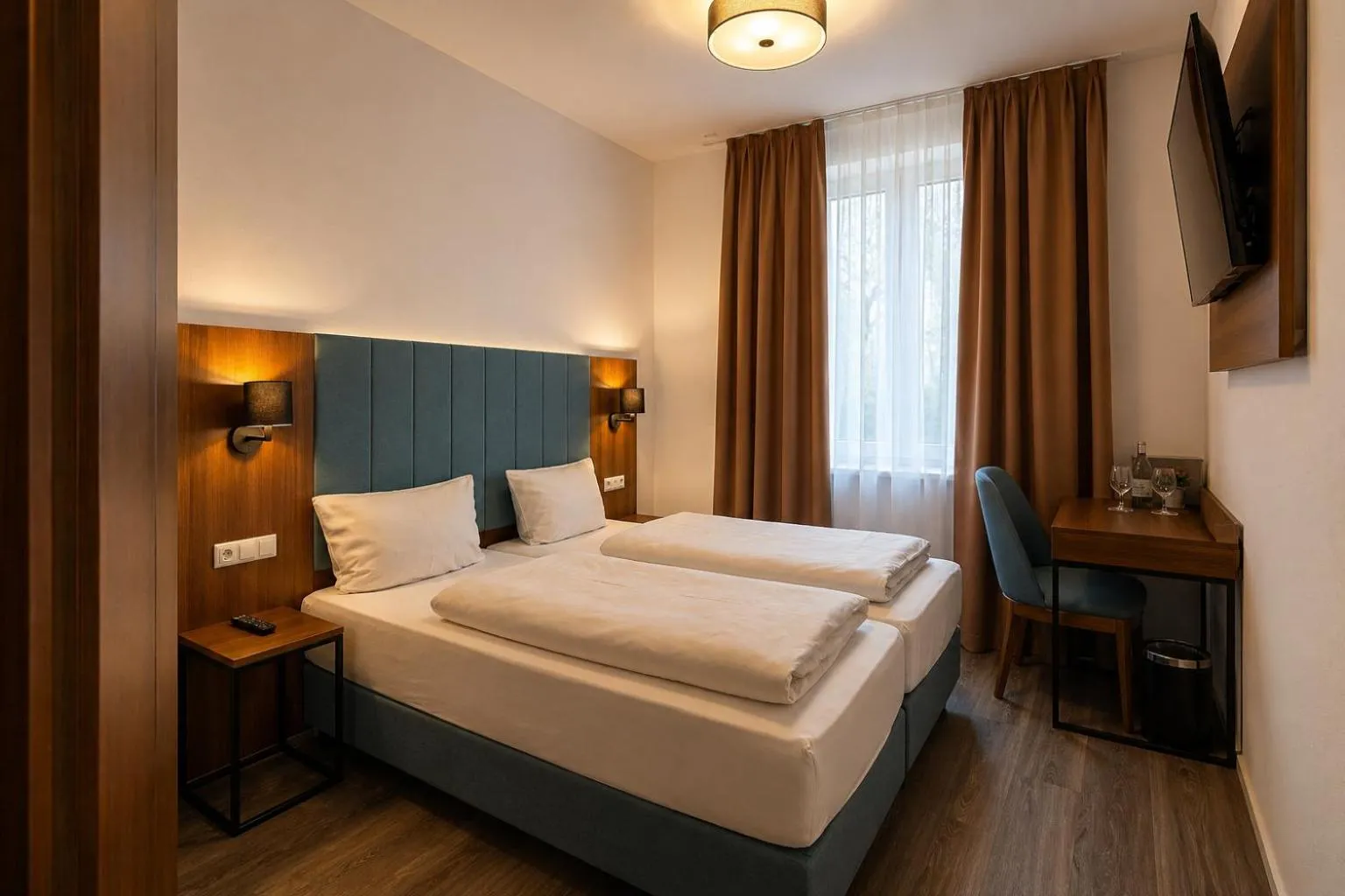 Living room, Bed in Lillys Hotel München