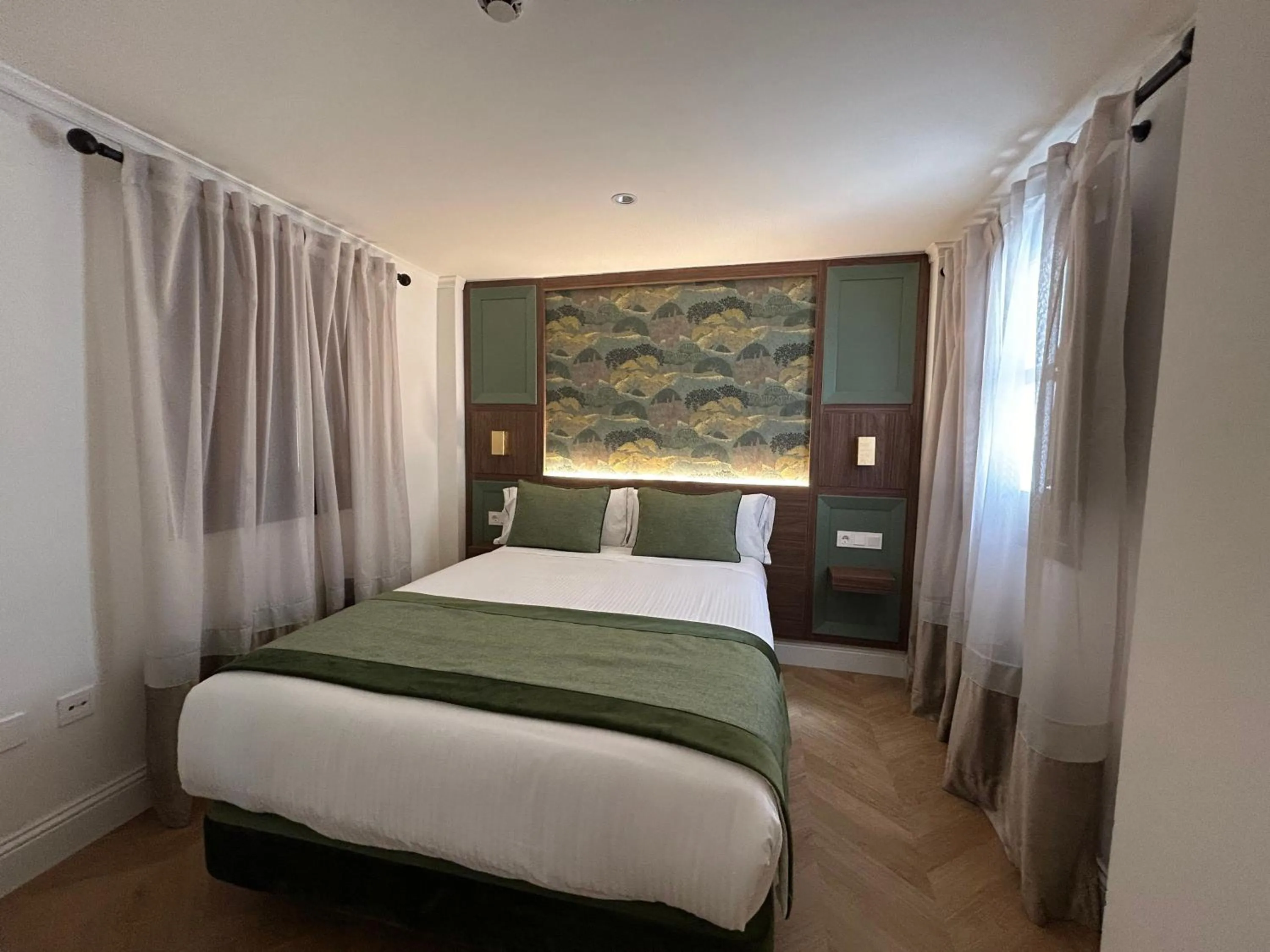 Bed in BiBo Suites Palacio de Portago