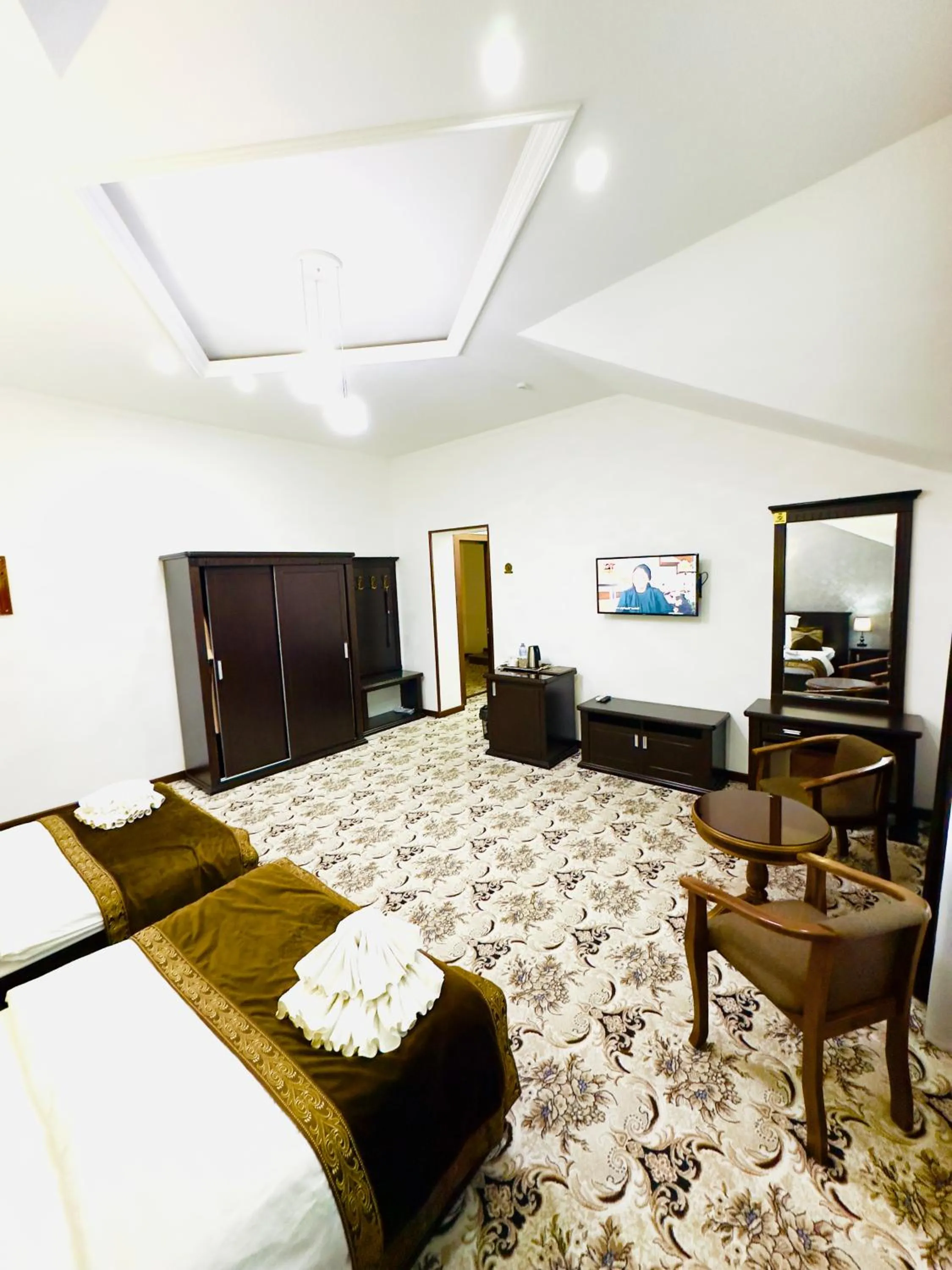 Communal lounge/ TV room, Bed in EMIRS GARDEN Residence