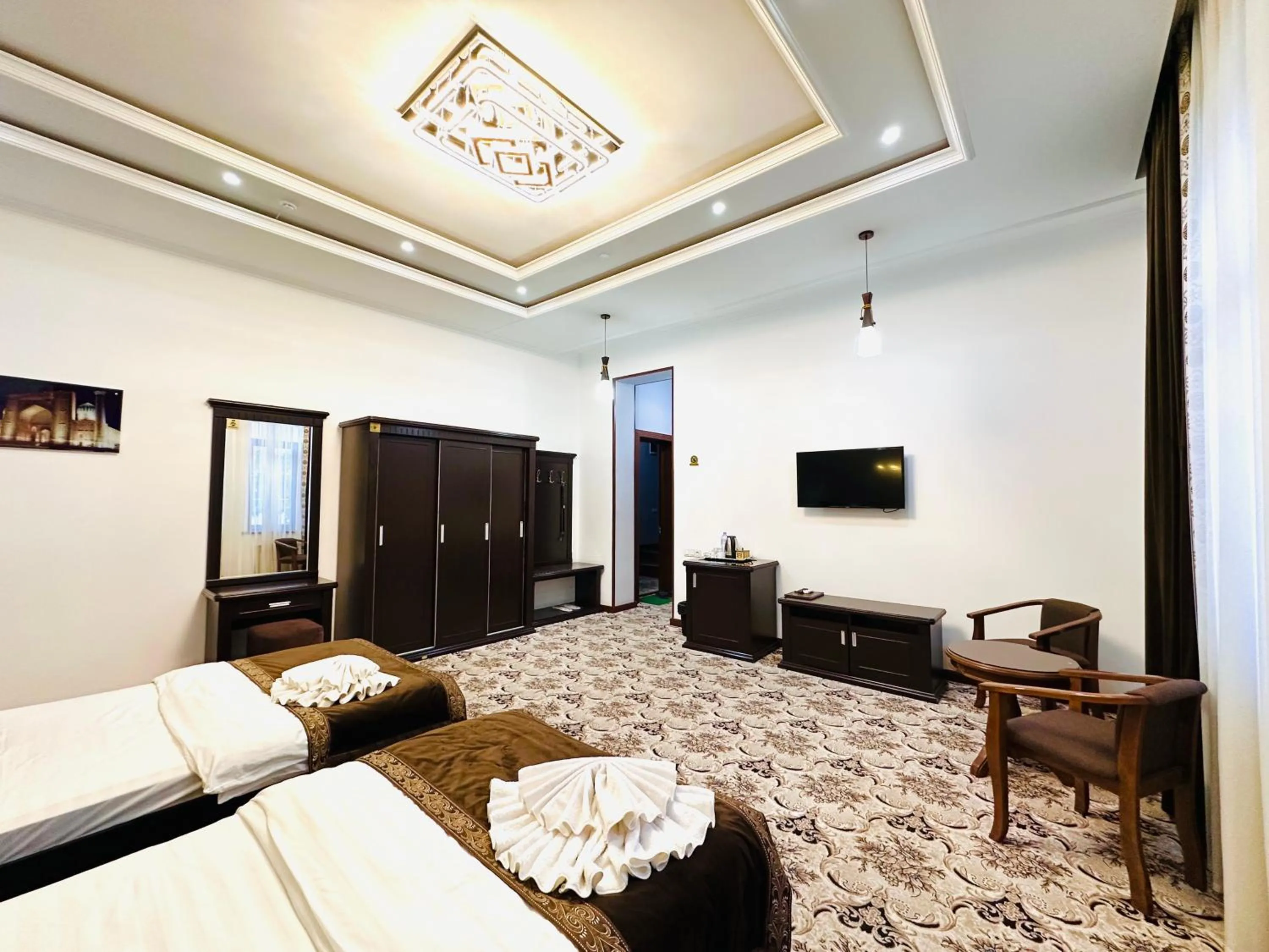 Communal lounge/ TV room, Bed in EMIRS GARDEN Residence