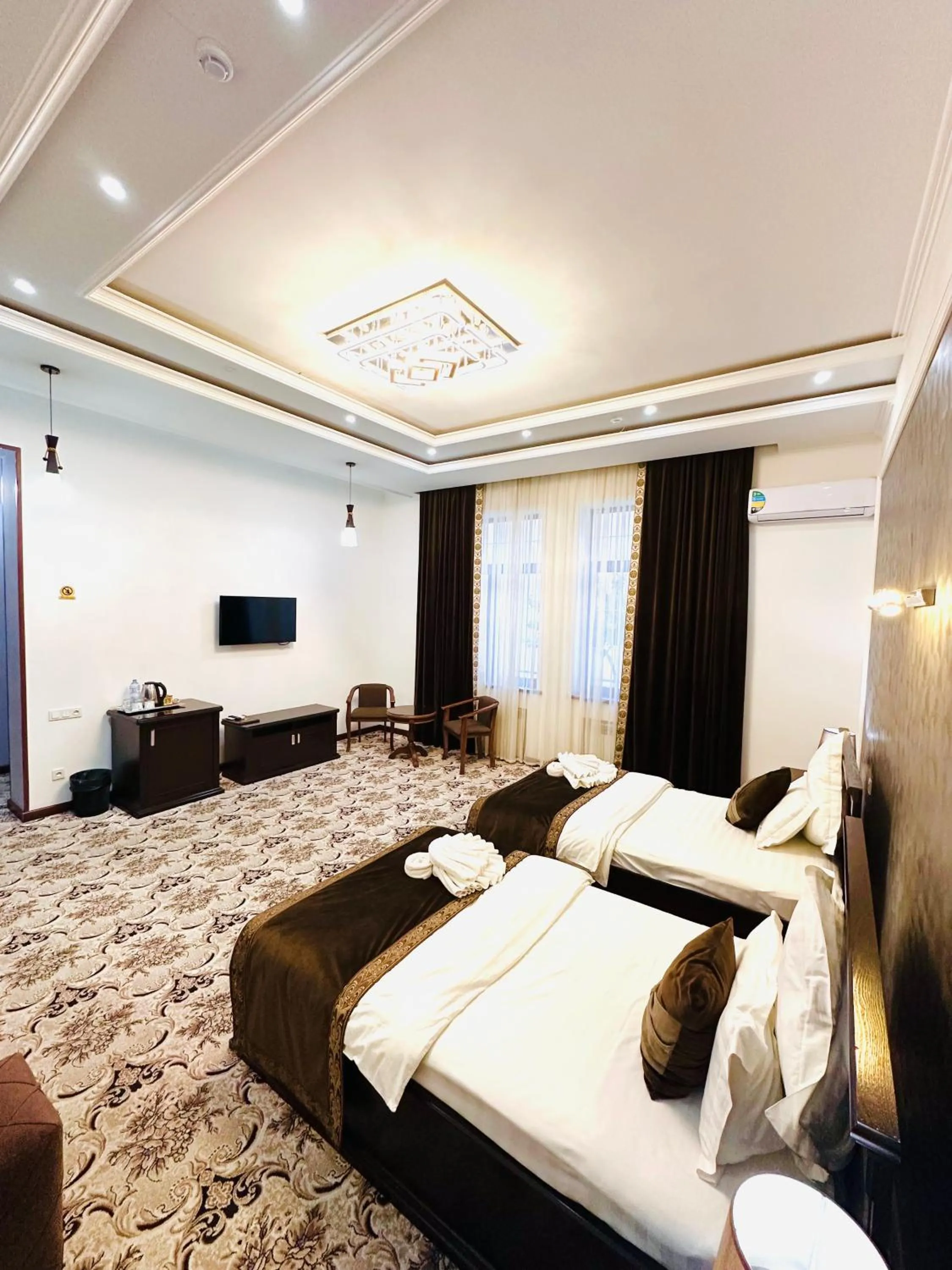 Communal lounge/ TV room, Bed in EMIRS GARDEN Residence