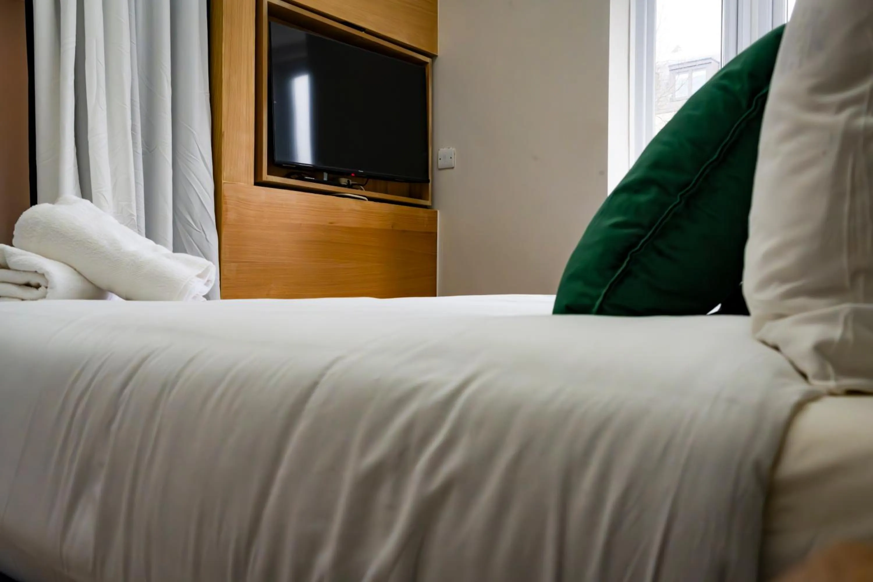 Bed in London Studios and Suites