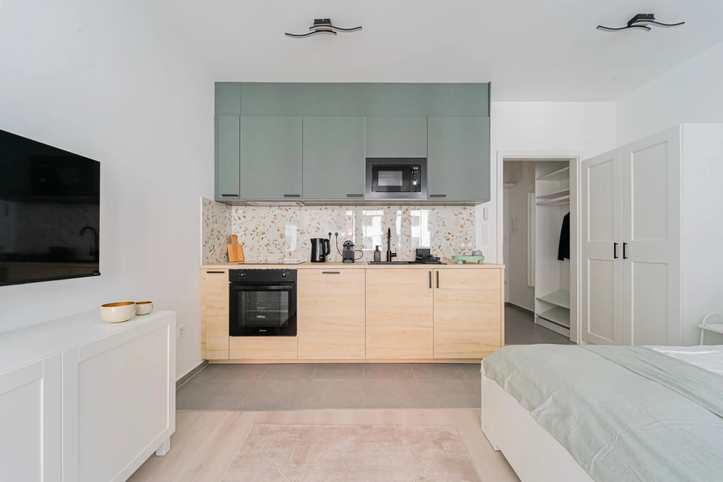 Bed in Spirit Apartments by FirstHost