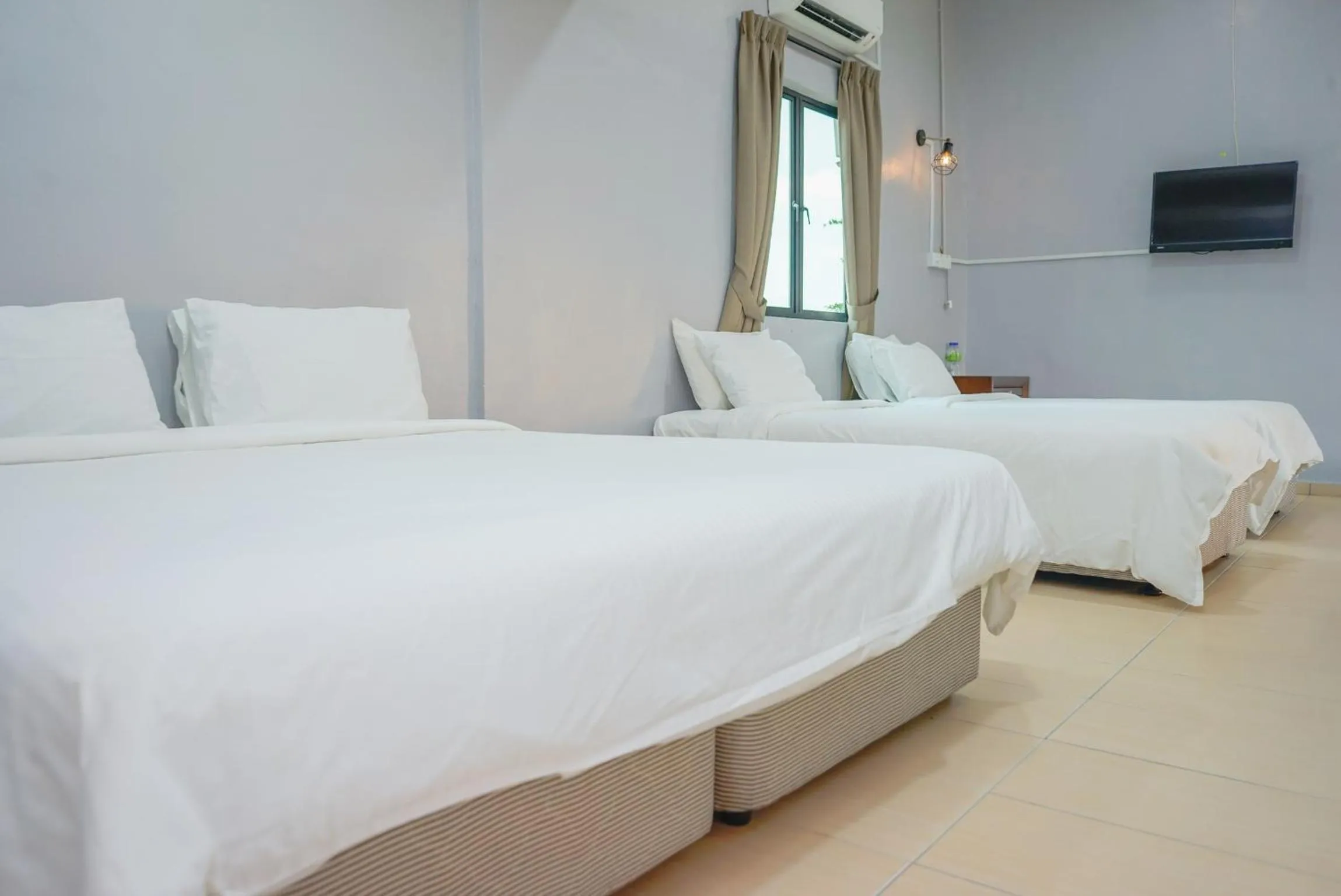 Bed in LABIS SUNRISE FARM STAY