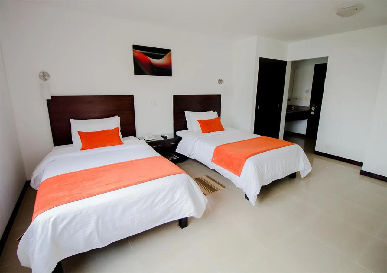 Bed in Hotel Pinares Plaza