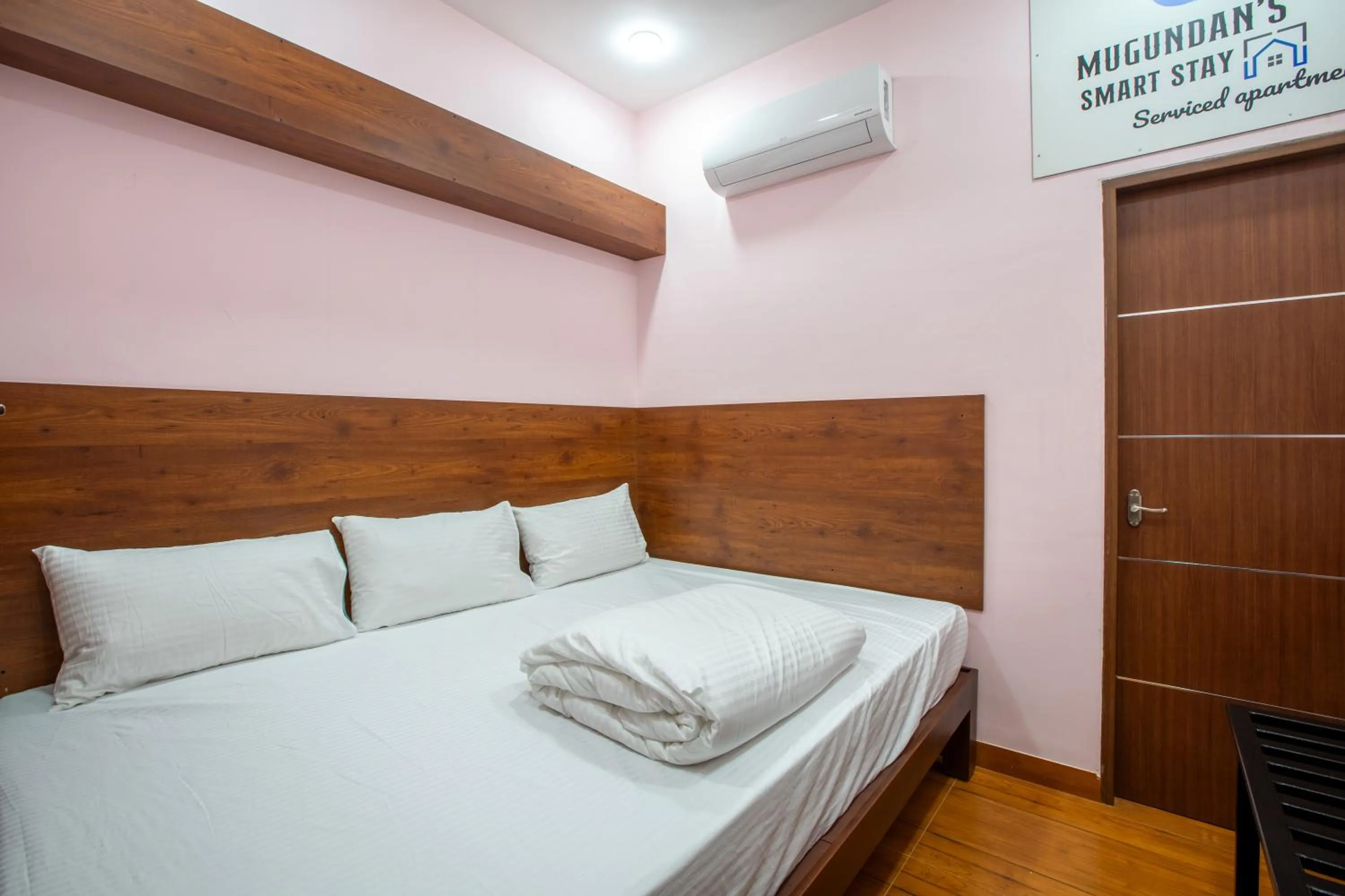 Bed in MUGUNDAN 'S SMART STAY