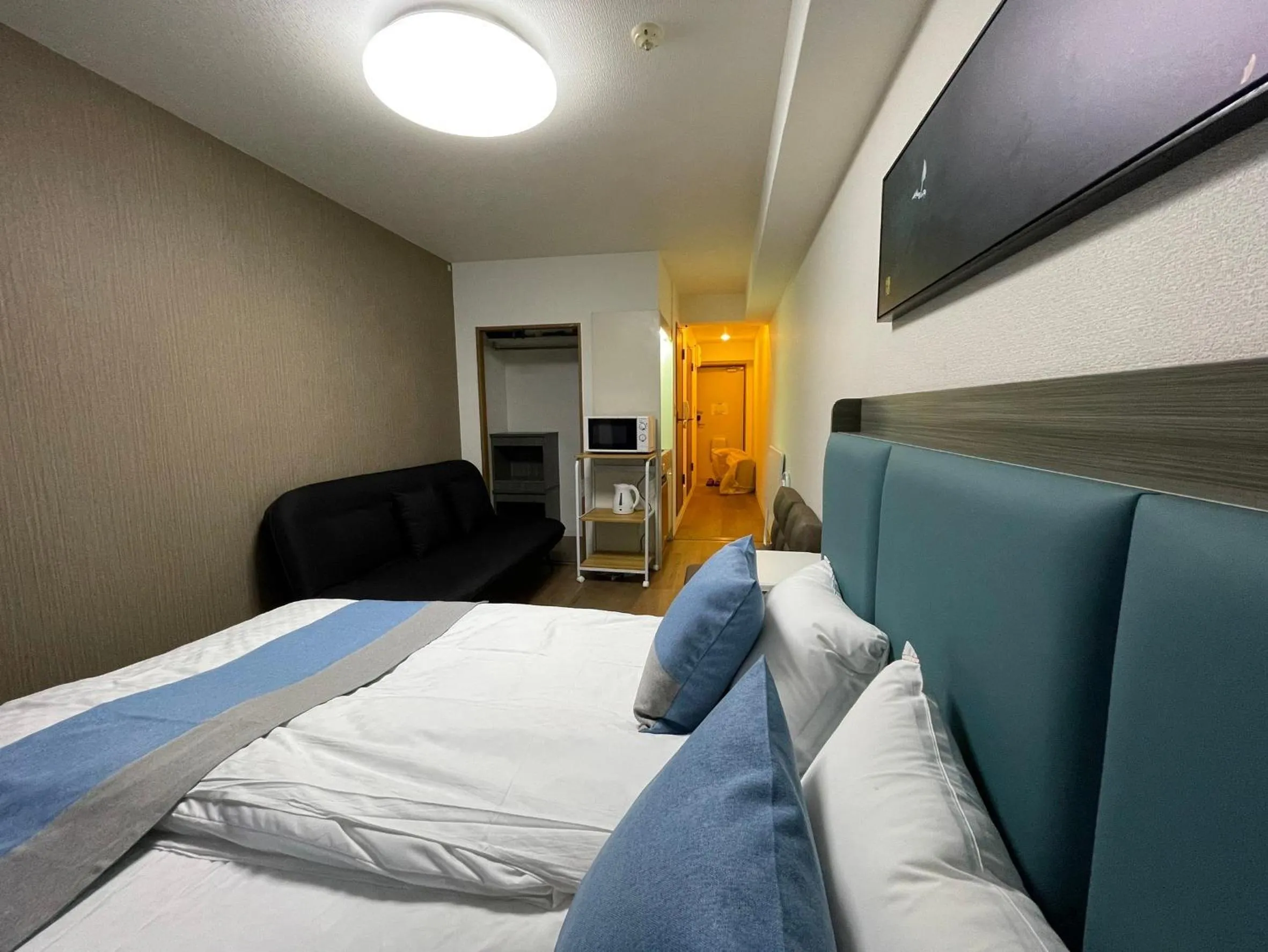 Bedroom, Bed in Sakura Sands Hotel Shinsaibashi