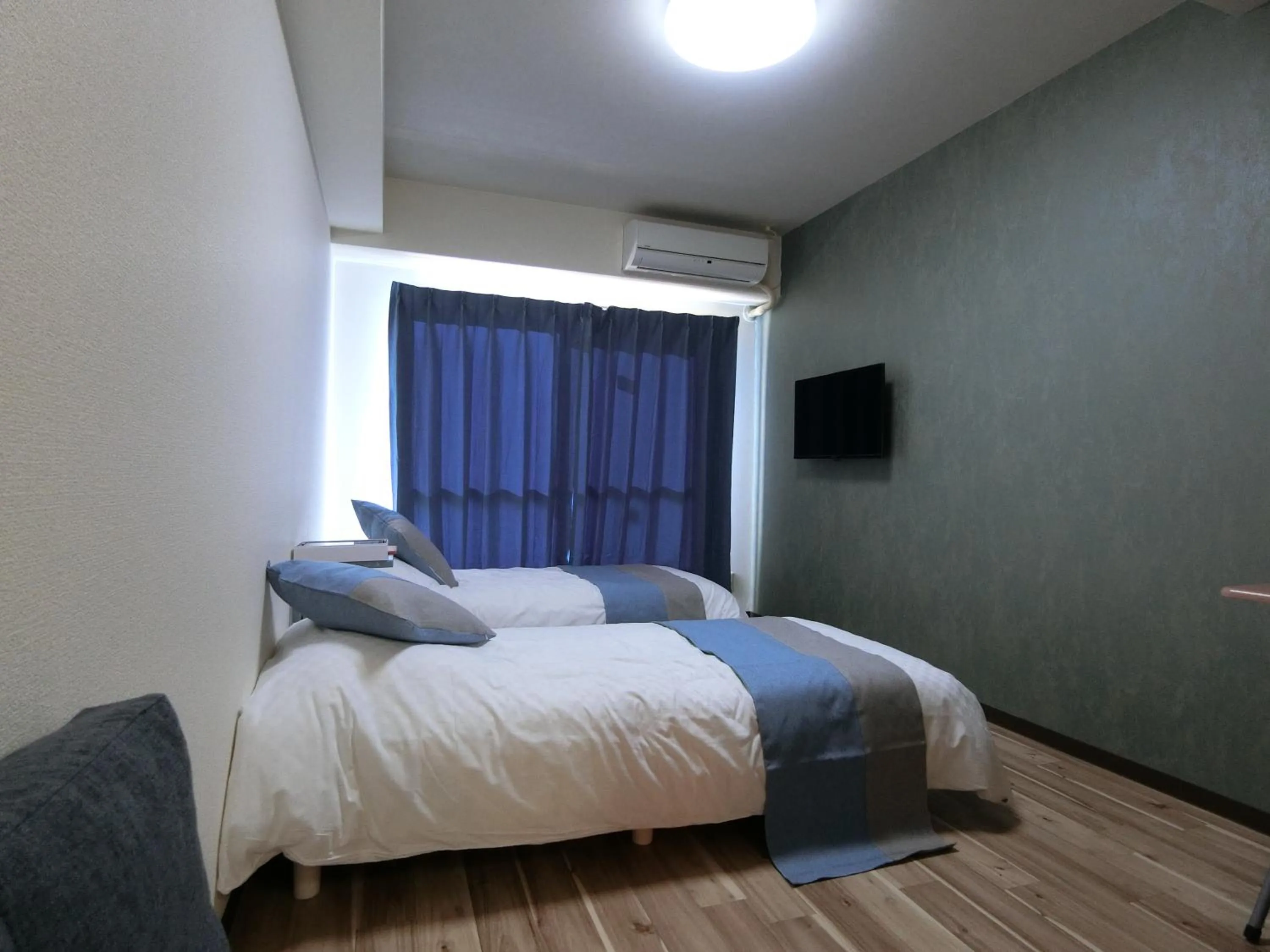 Bed in Sakura Sands Hotel Shinsaibashi