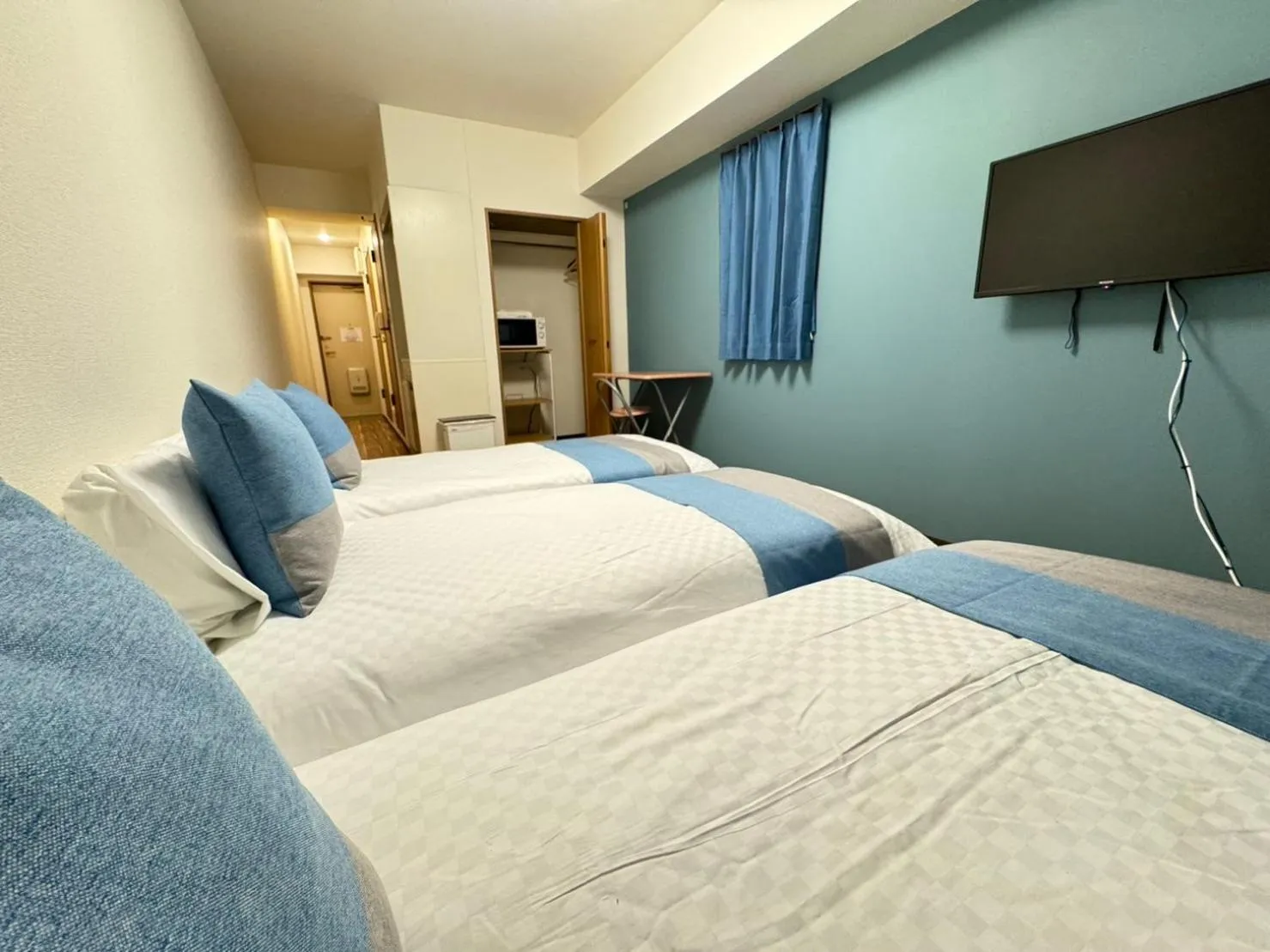 Photo of the whole room, Bed in Sakura Sands Hotel Shinsaibashi