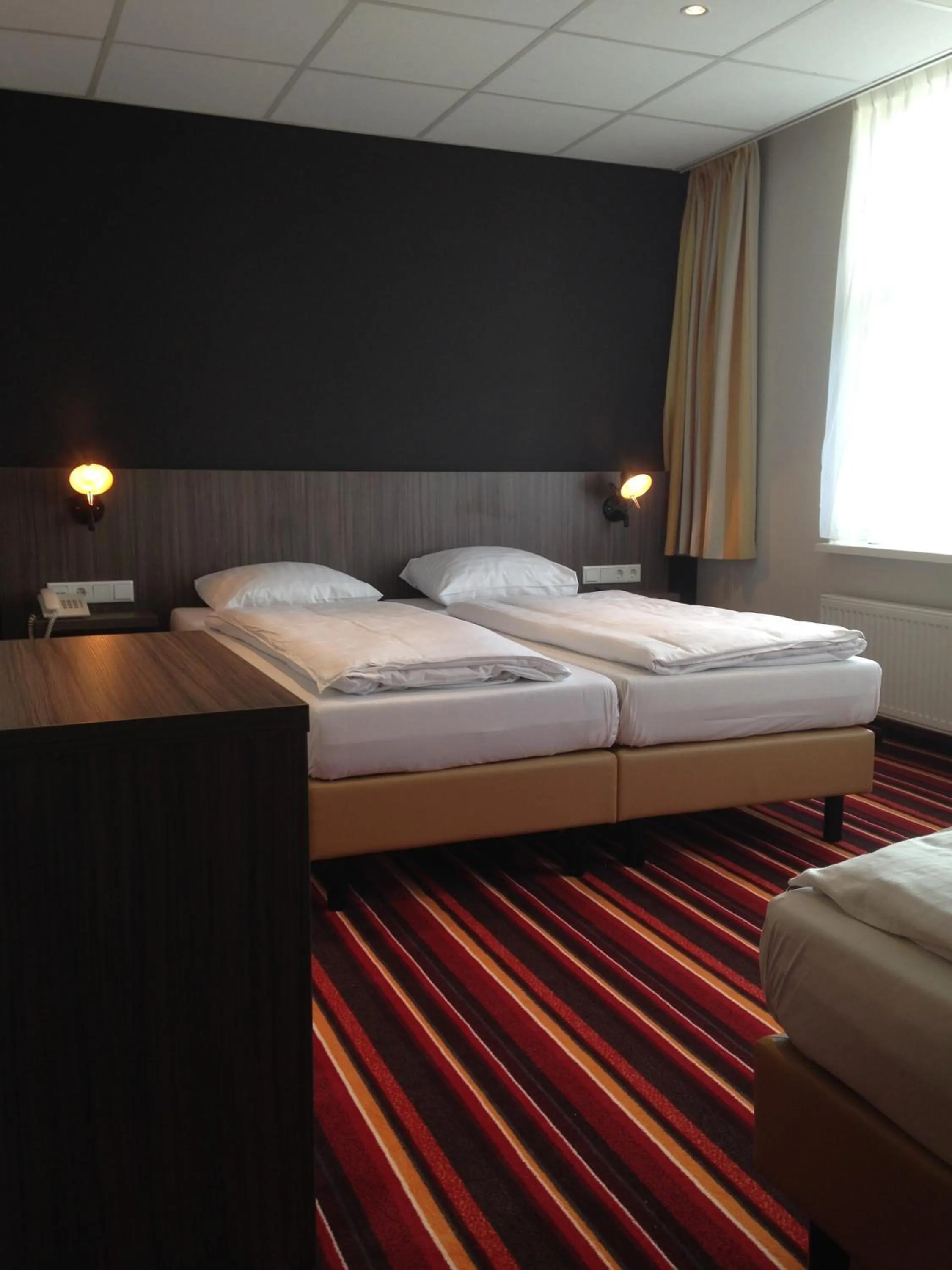 Bed in Mozart Hotel