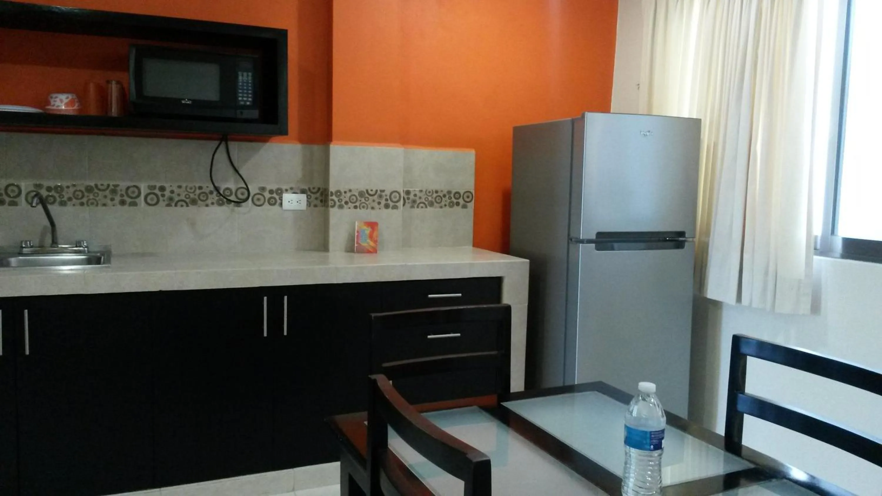 Kitchen or kitchenette in Hotel & Suites Domani