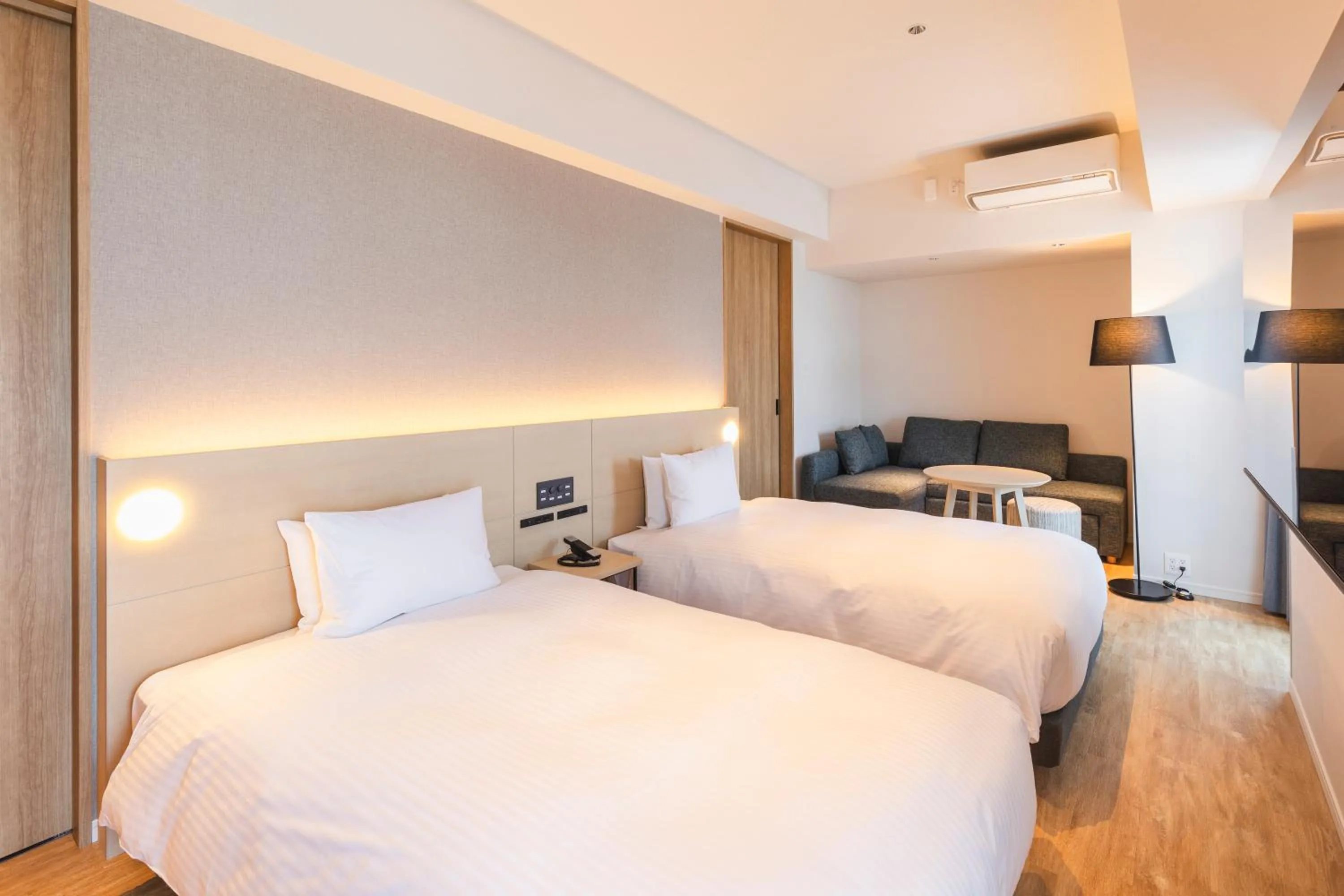 Living room, Bed in Sotetsu Hotels The Splaisir Yokohama