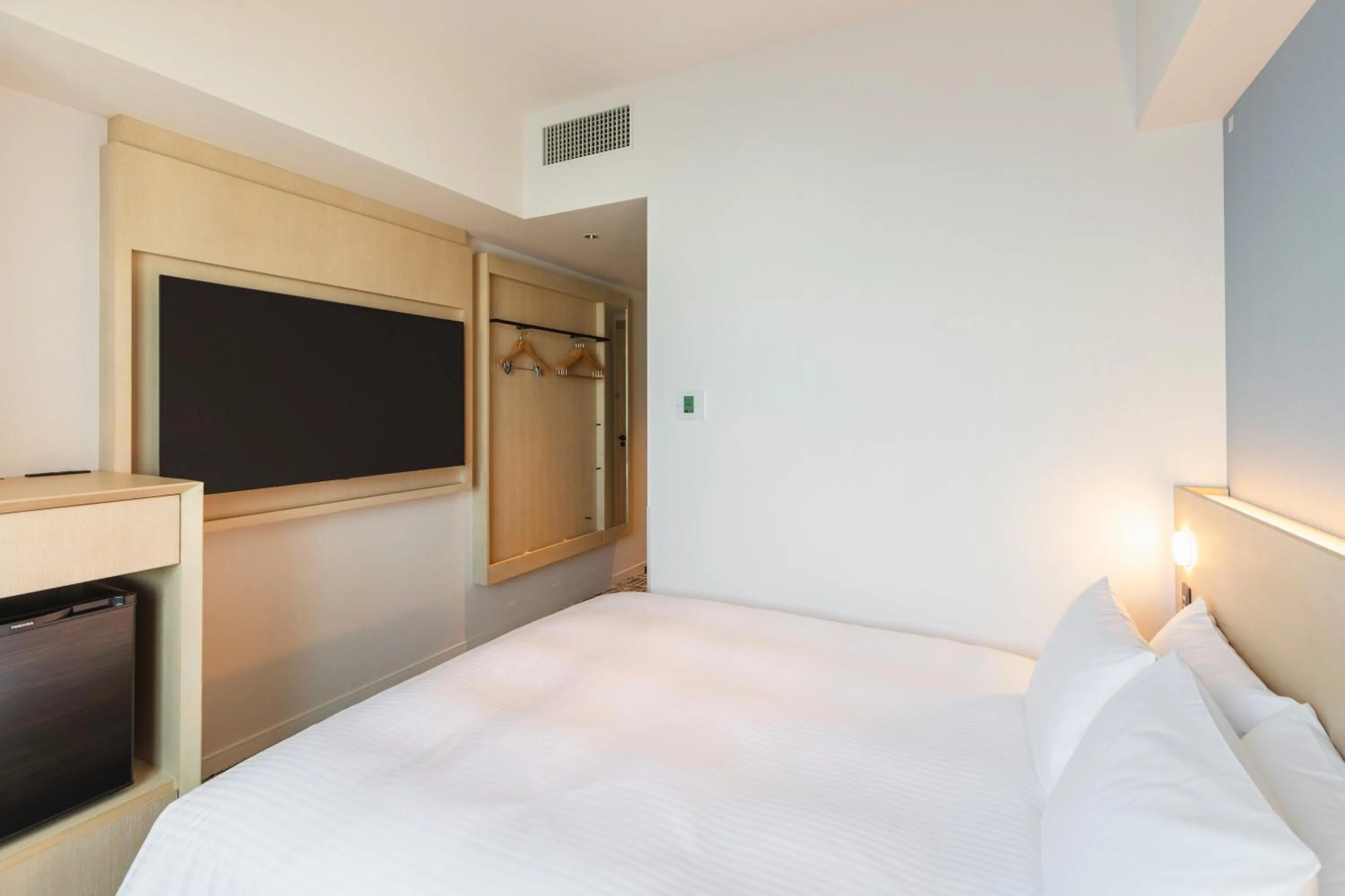 Bed in Sotetsu Hotels The Splaisir Yokohama