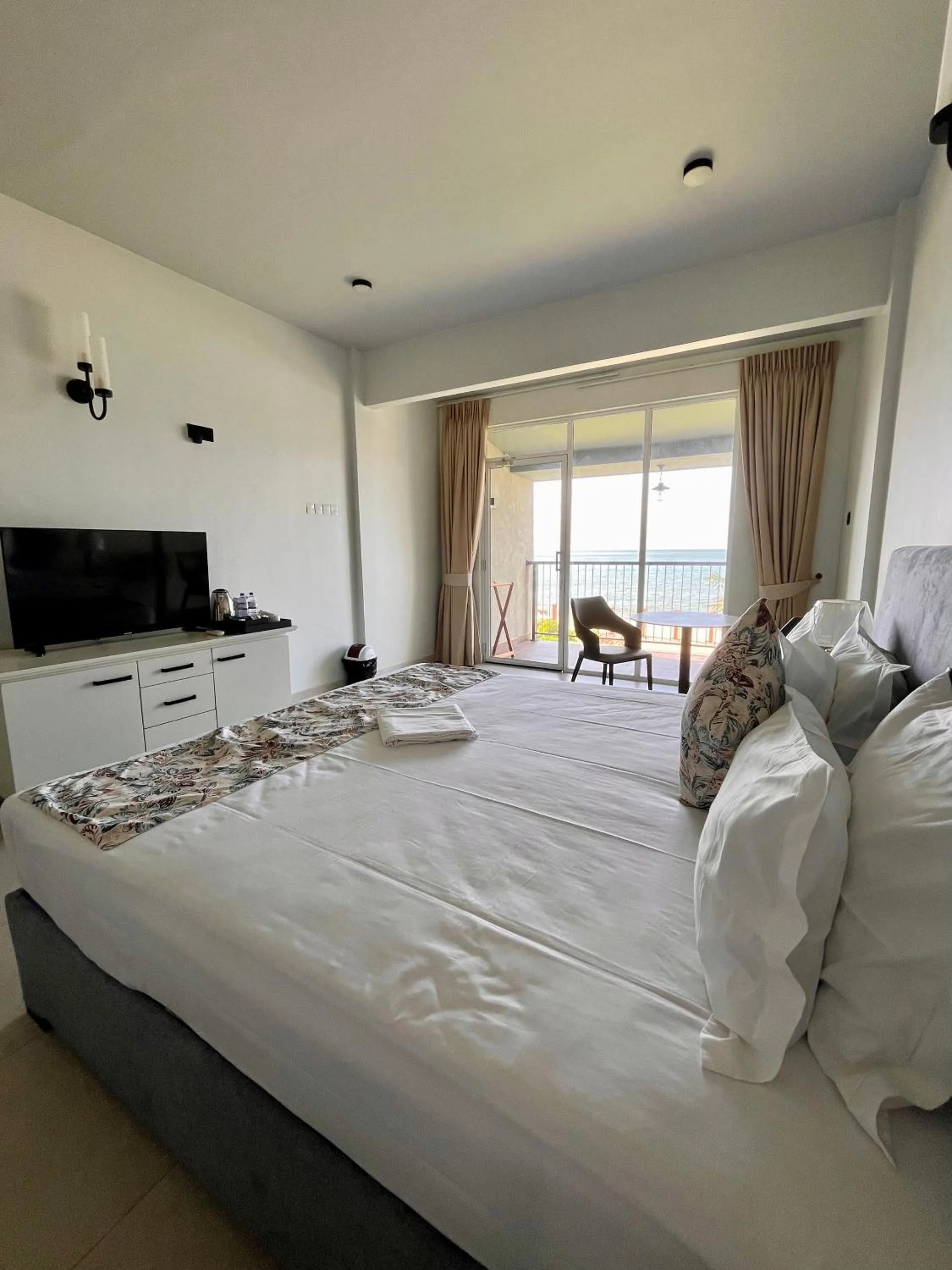 Bed in Hiru Beach Resort