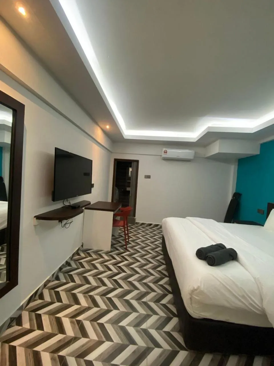 Bed in HOTEL HOMESTAY MACHANG D Sega