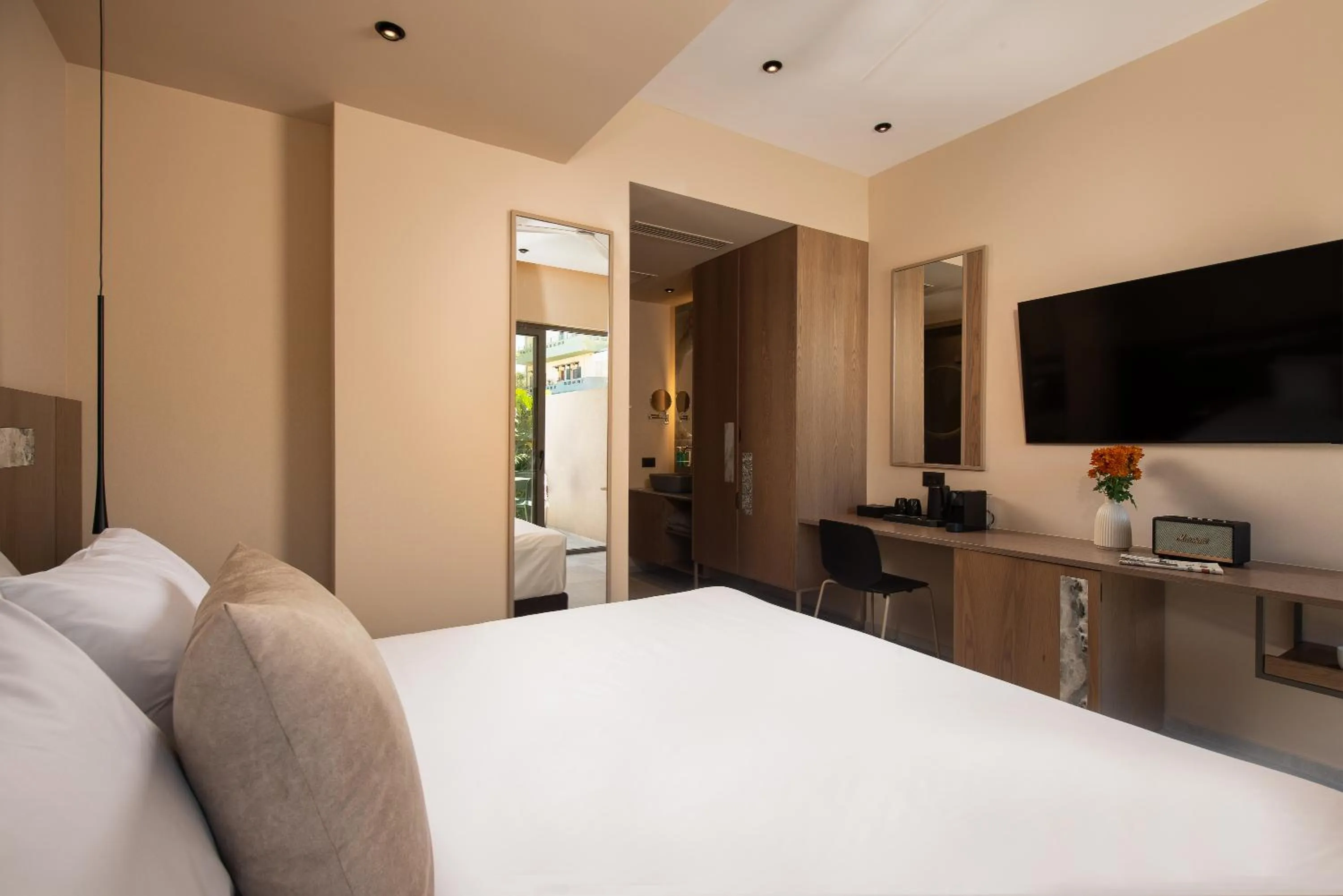 Bed in Cosmeen Lifestyle Boutique Stay