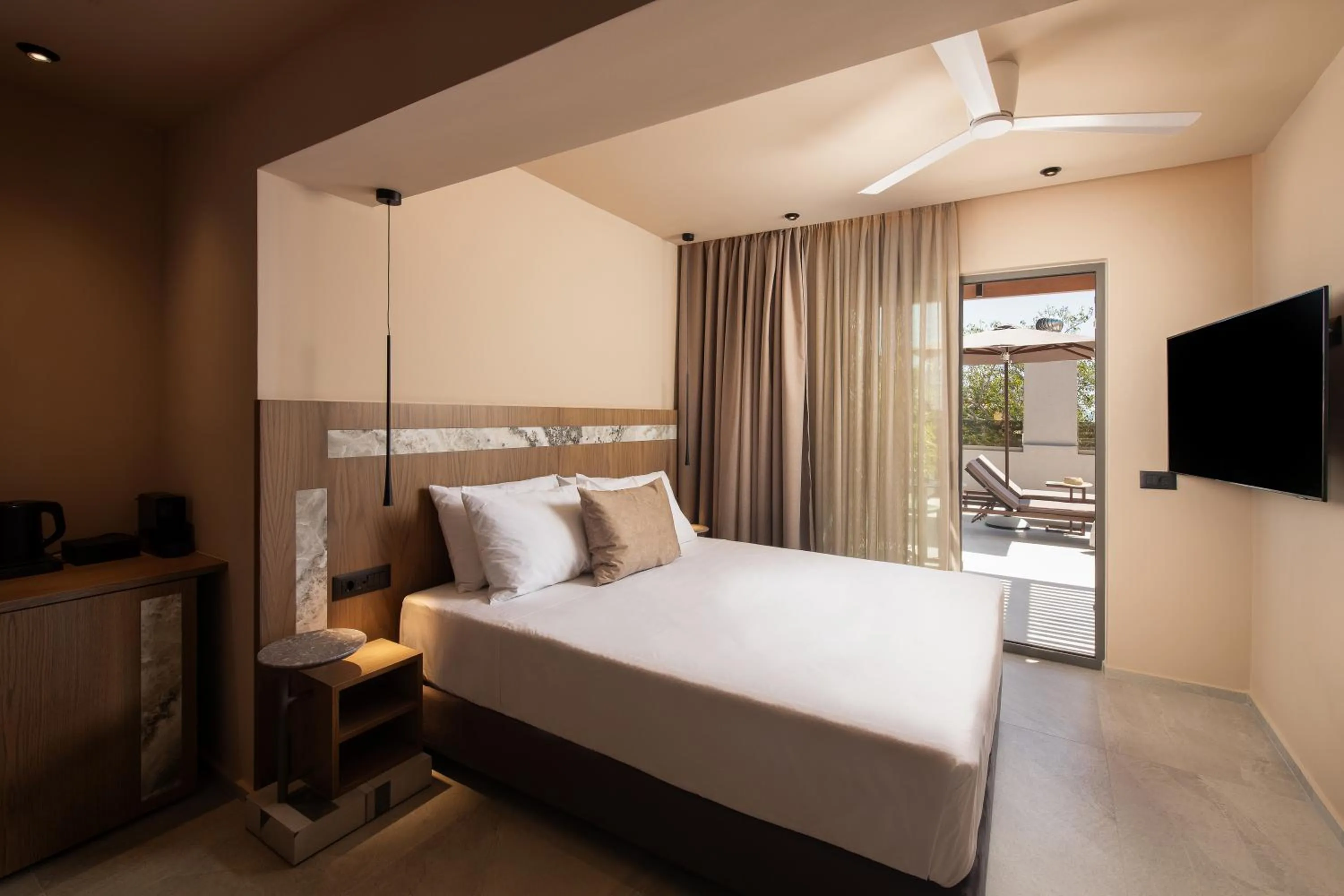 Bed in Cosmeen Lifestyle Boutique Stay