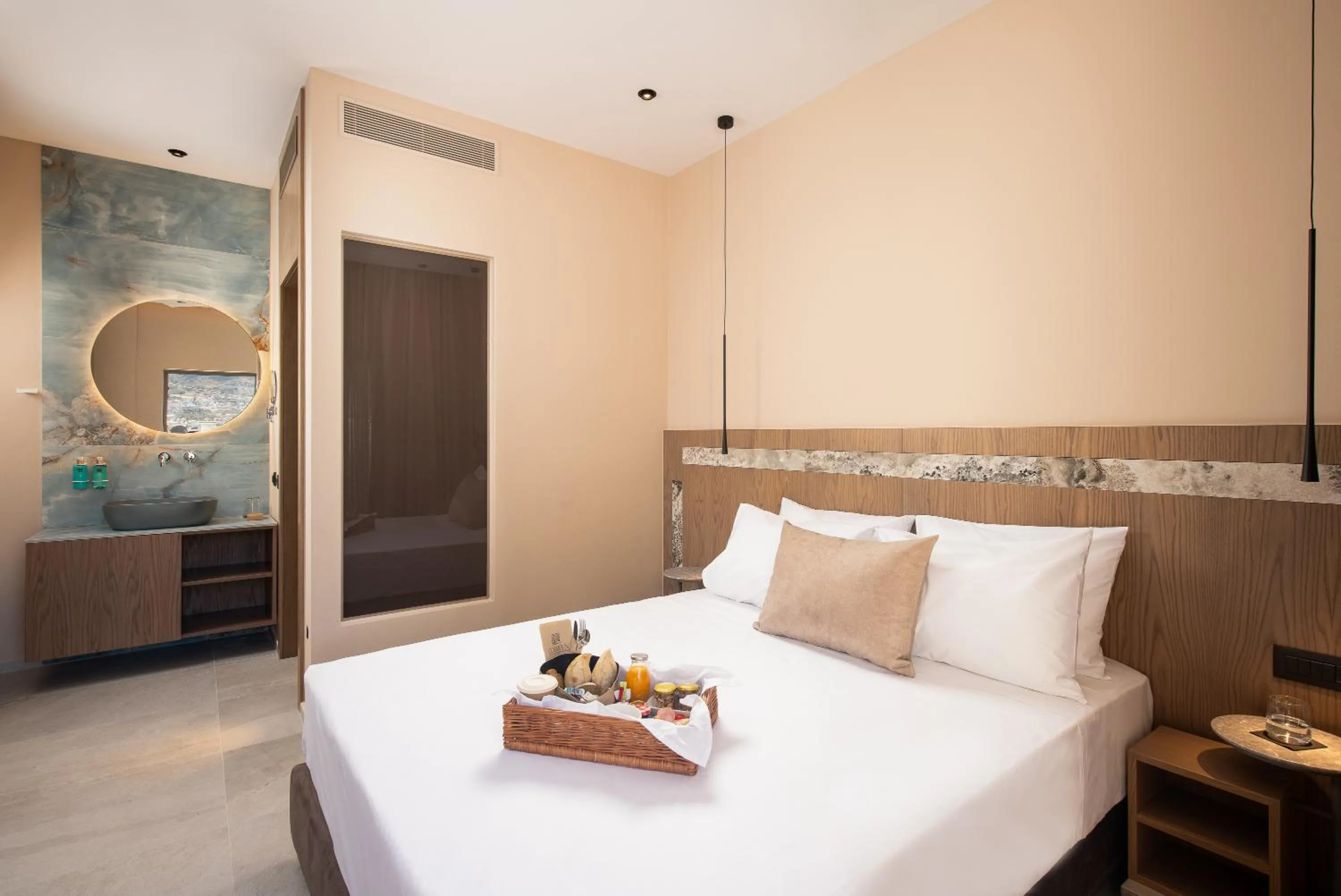 Bed in Cosmeen Lifestyle Boutique Stay