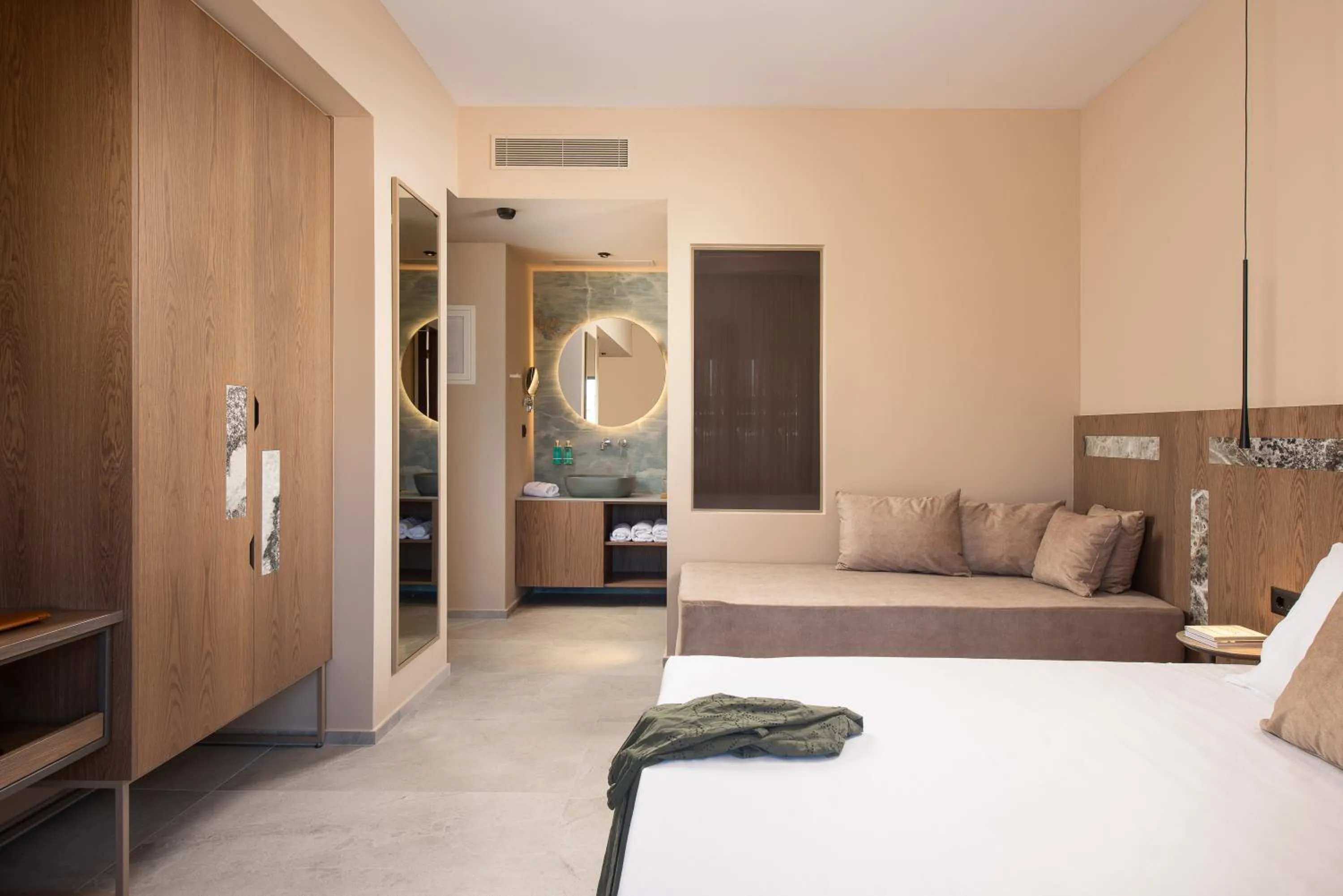 Bed in Cosmeen Lifestyle Boutique Stay