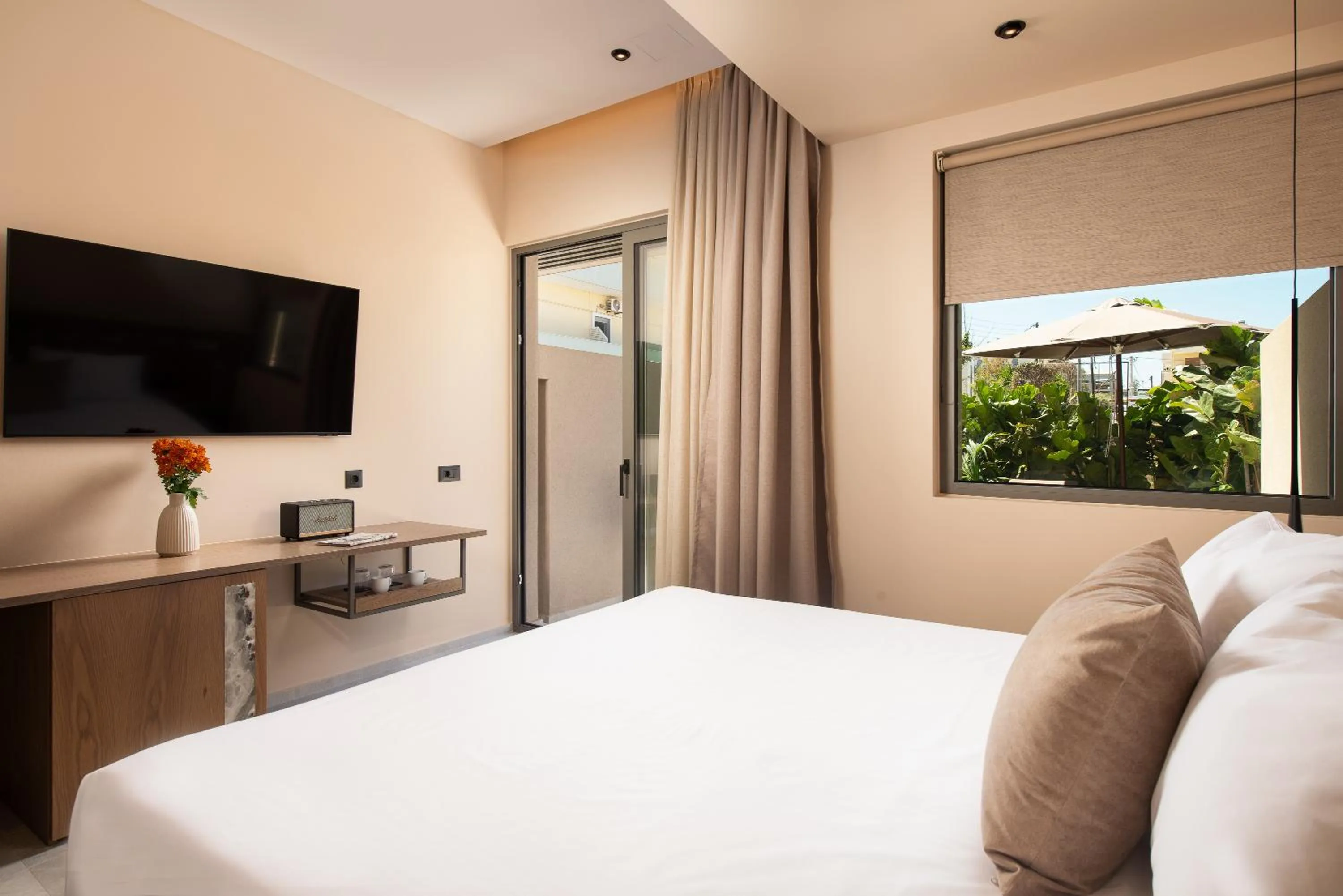 Bed in Cosmeen Lifestyle Boutique Stay