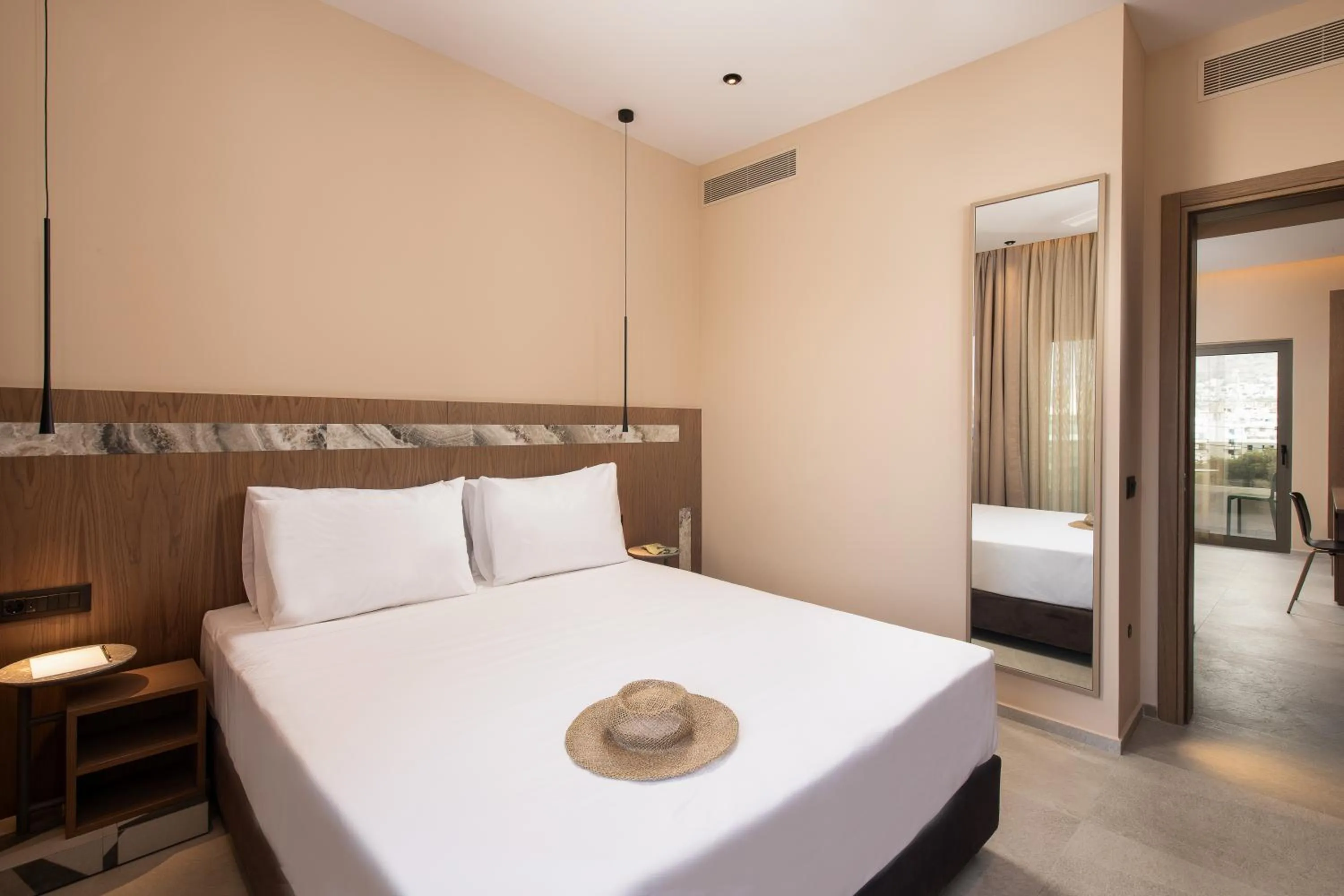 Bed in Cosmeen Lifestyle Boutique Stay