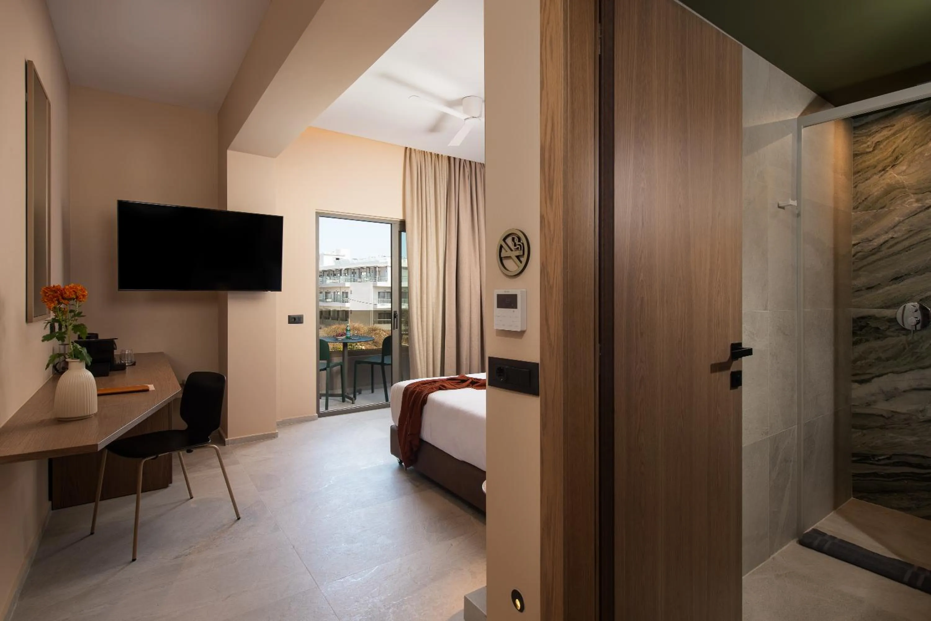 Bed in Cosmeen Lifestyle Boutique Stay