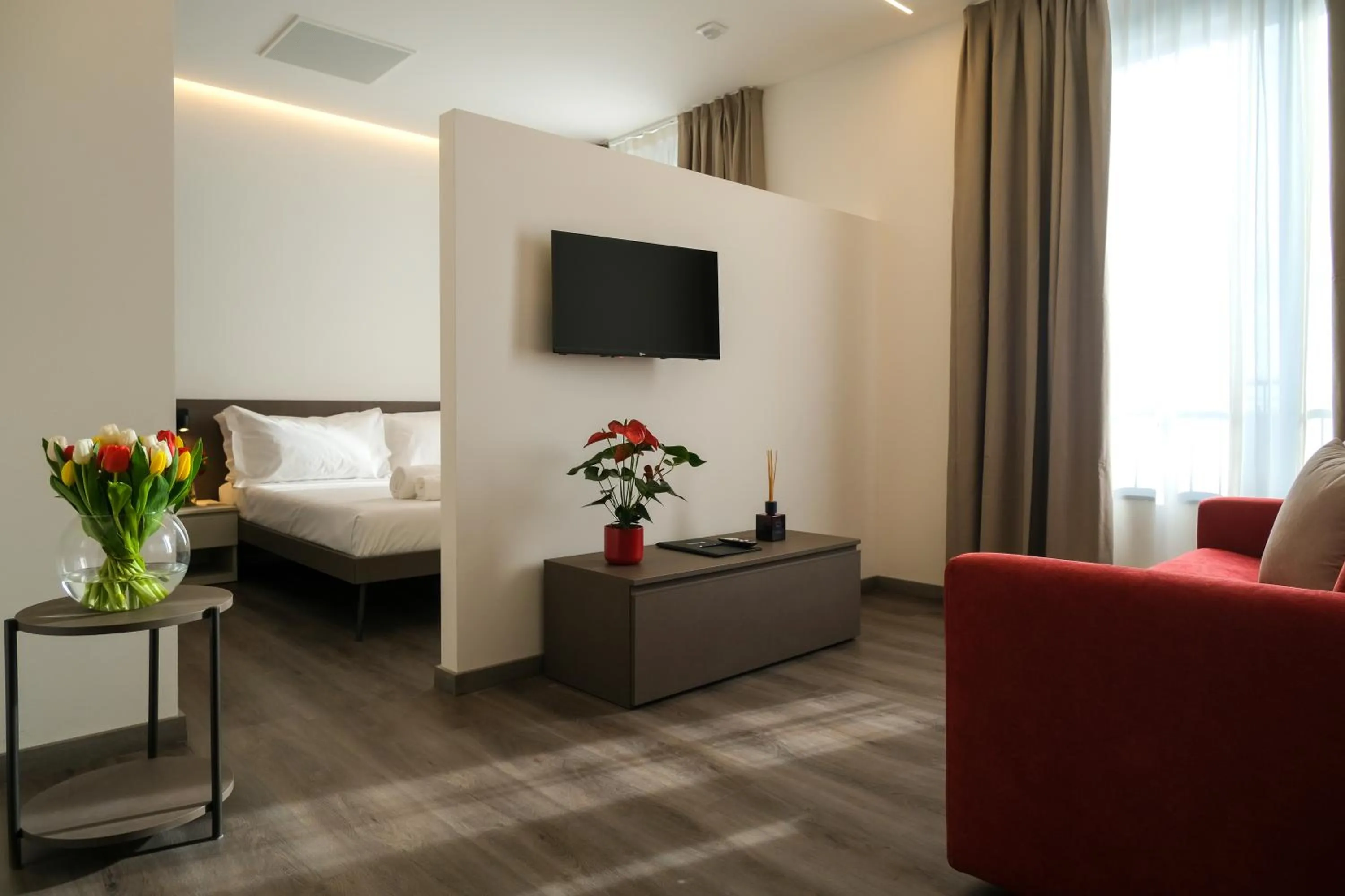 Living room, Bed in Emerald Green Residence