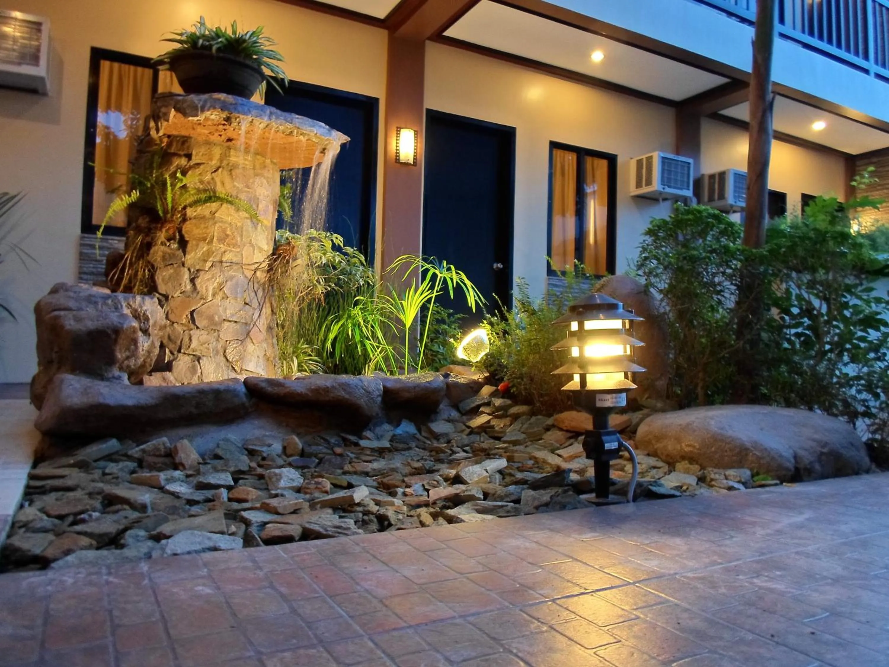 Facade/entrance in Pacific Palm Suites Davao powered by Cocotel