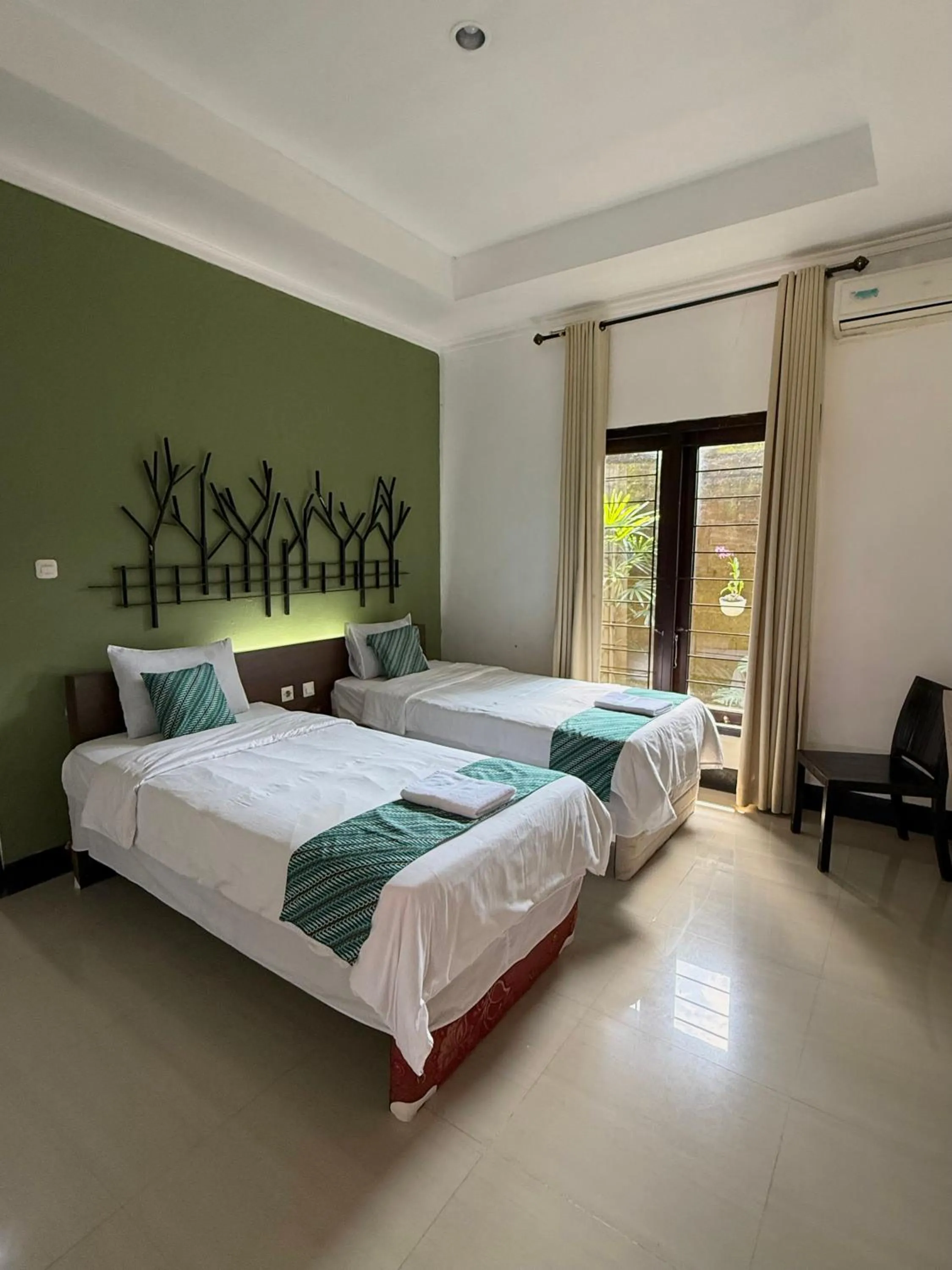 Bed in Villa Padi Cangkringan