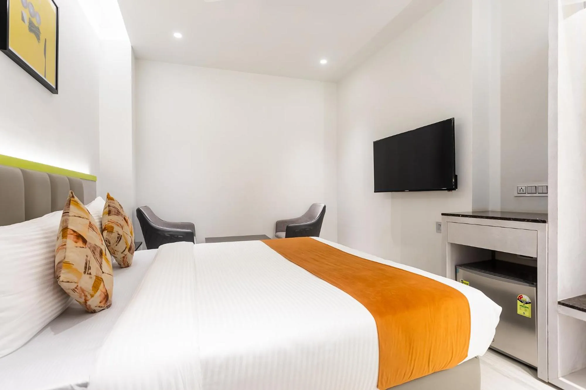 Bed in FabHotel Orange Oasis