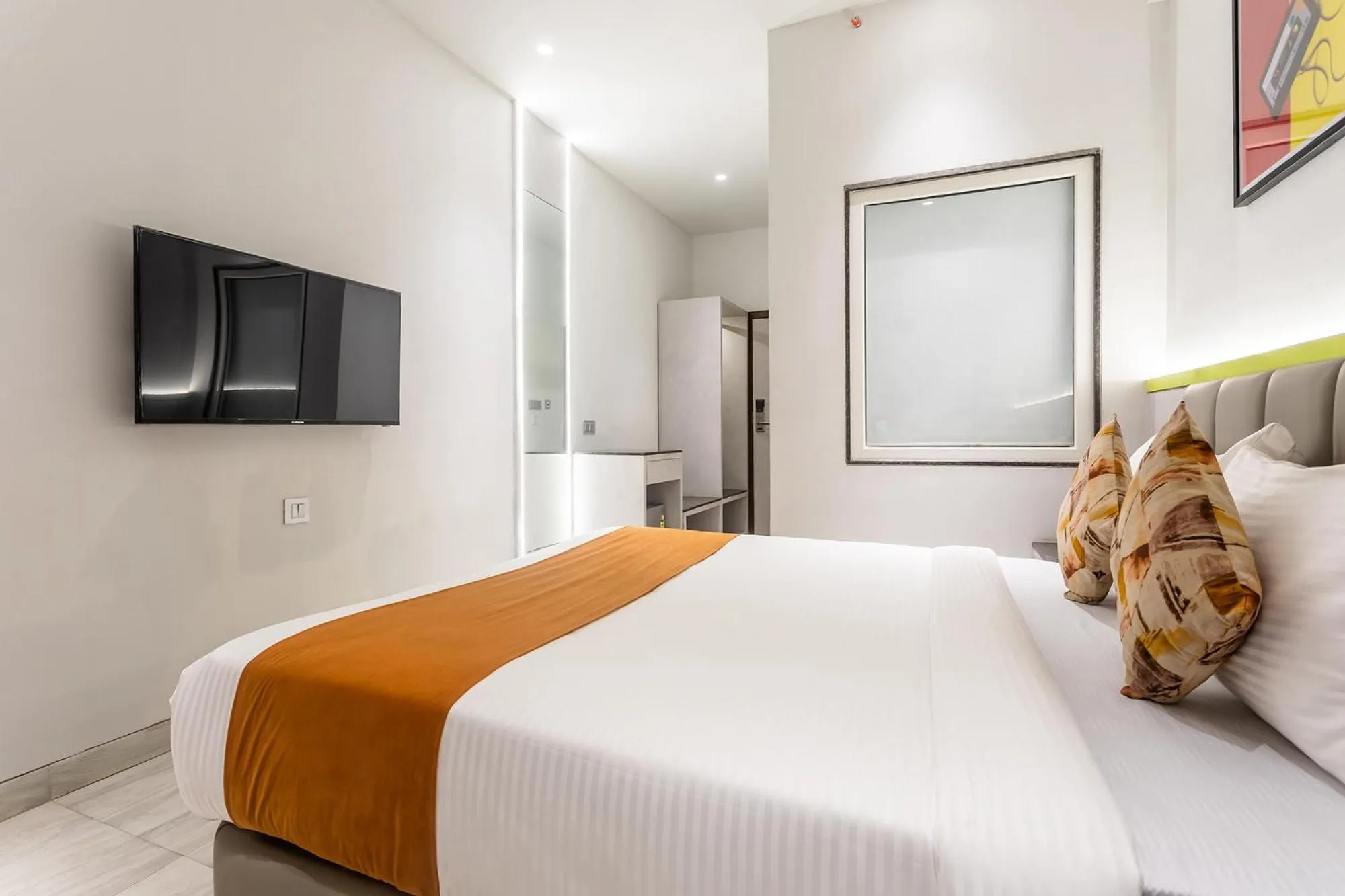 Bed in FabHotel Orange Oasis