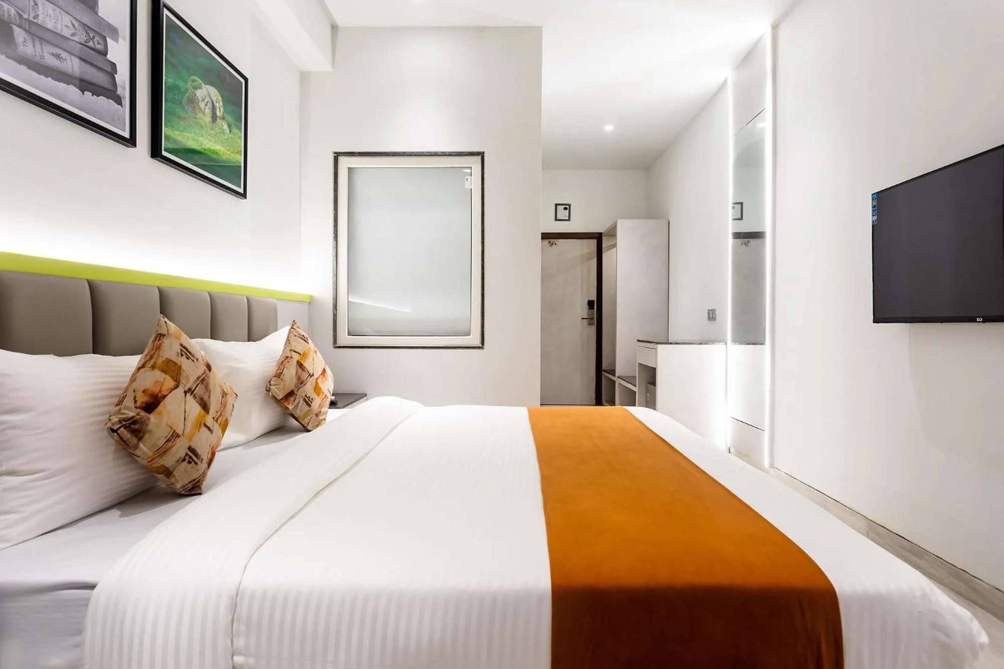 Bed in FabHotel Orange Oasis