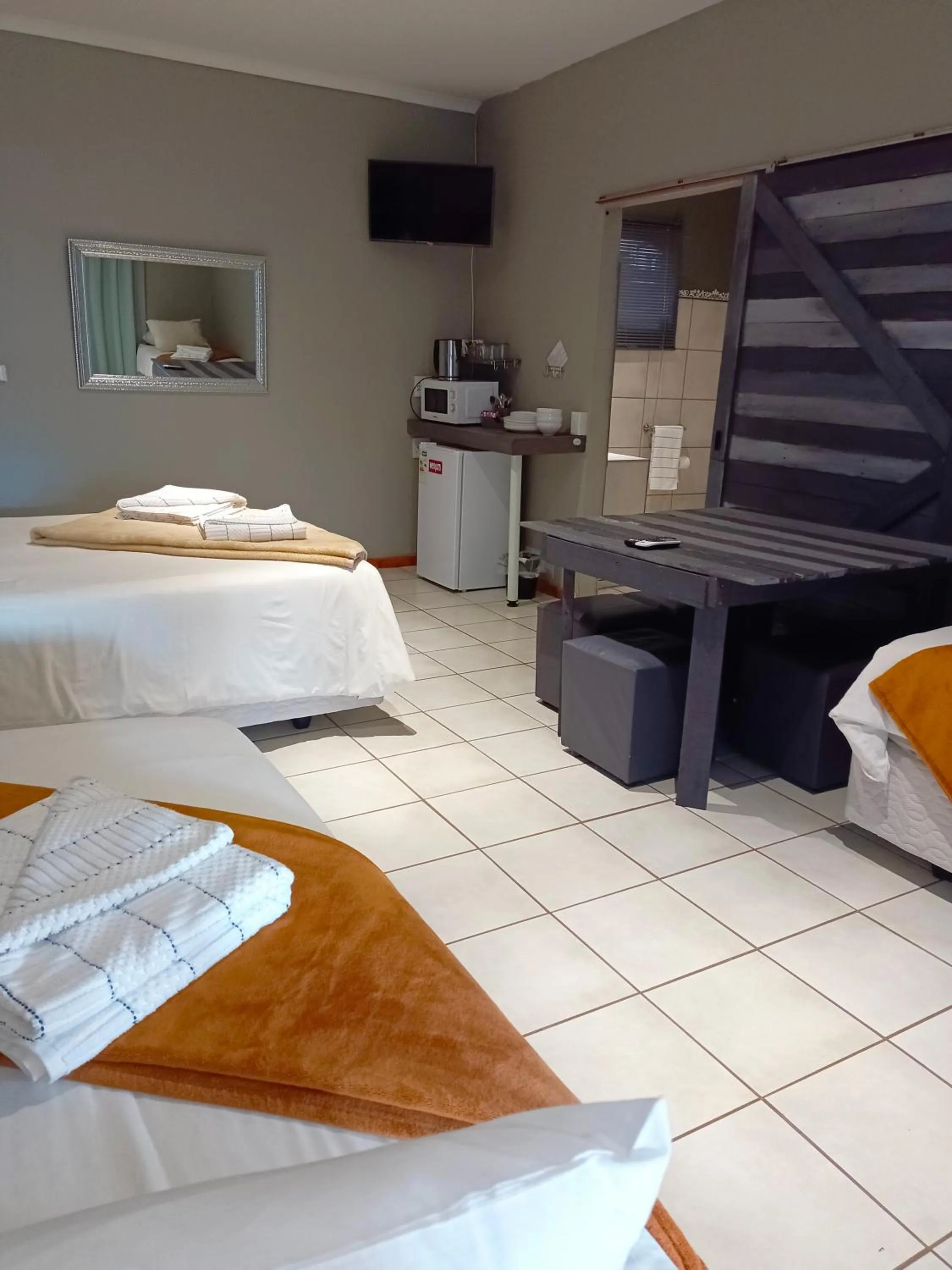 Photo of the whole room, Bed in 21 On Coetzee Guest House