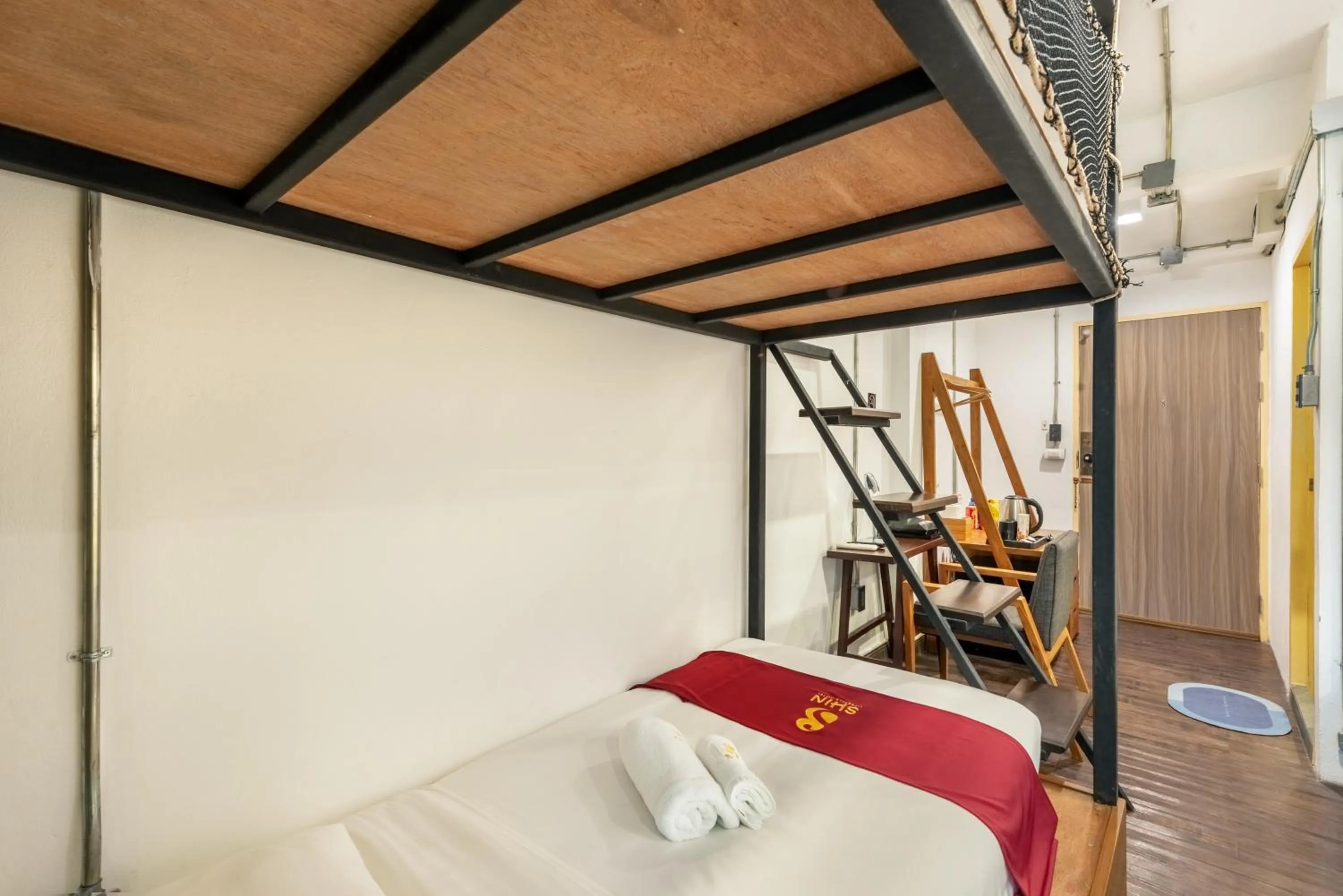 Bed in SHIN Hotel Nimman ChiangMai