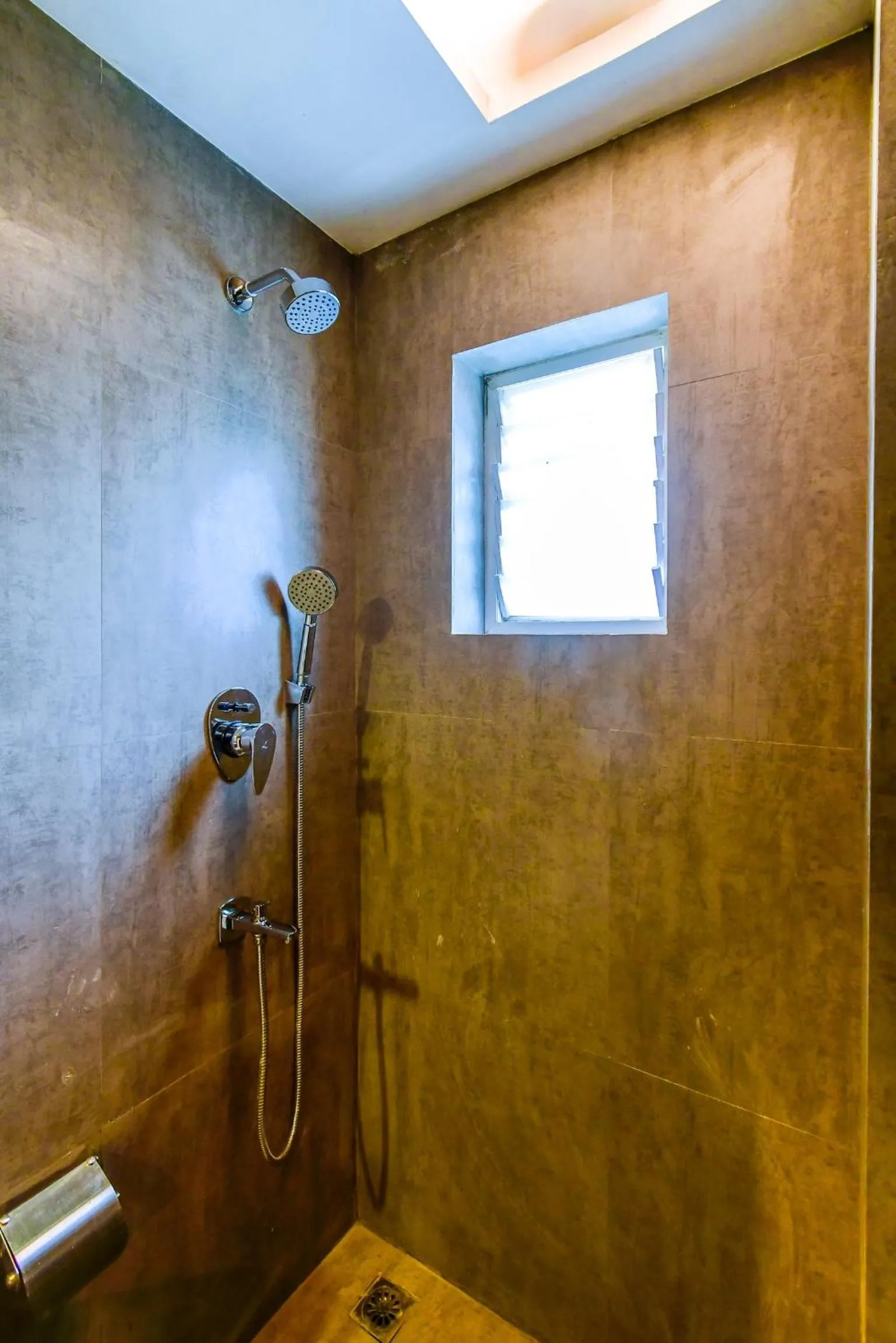 Bathroom in Revaa Hotels