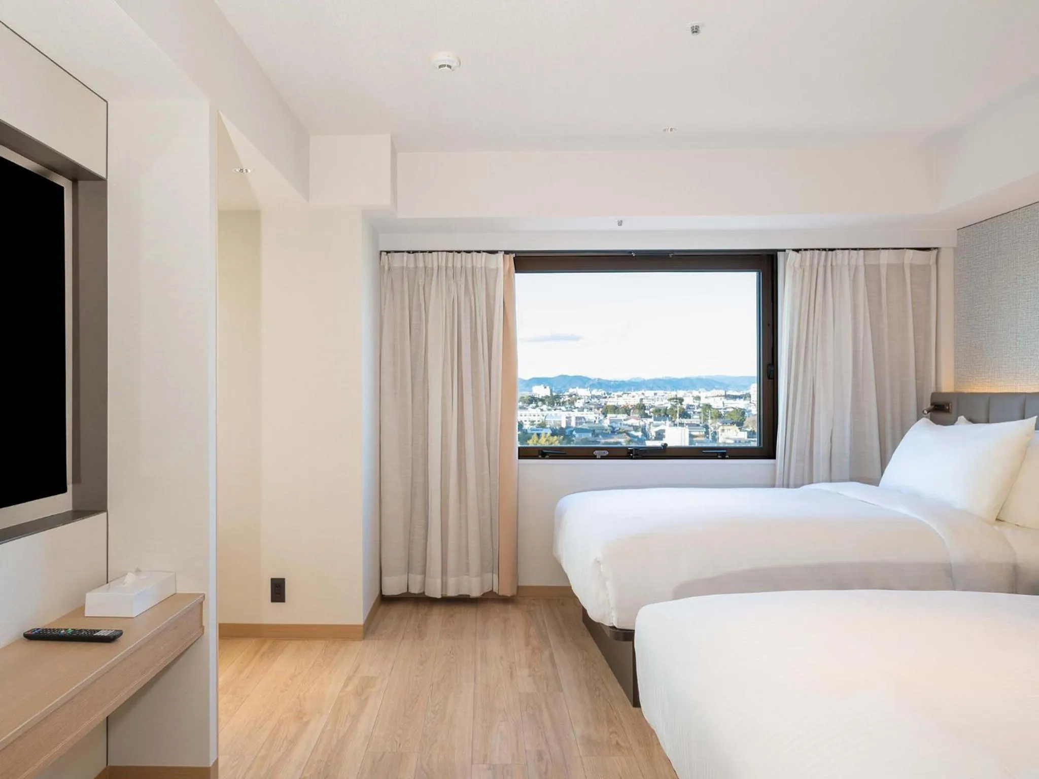 Photo of the whole room, Bed in Grand Hotel Hamamatsu