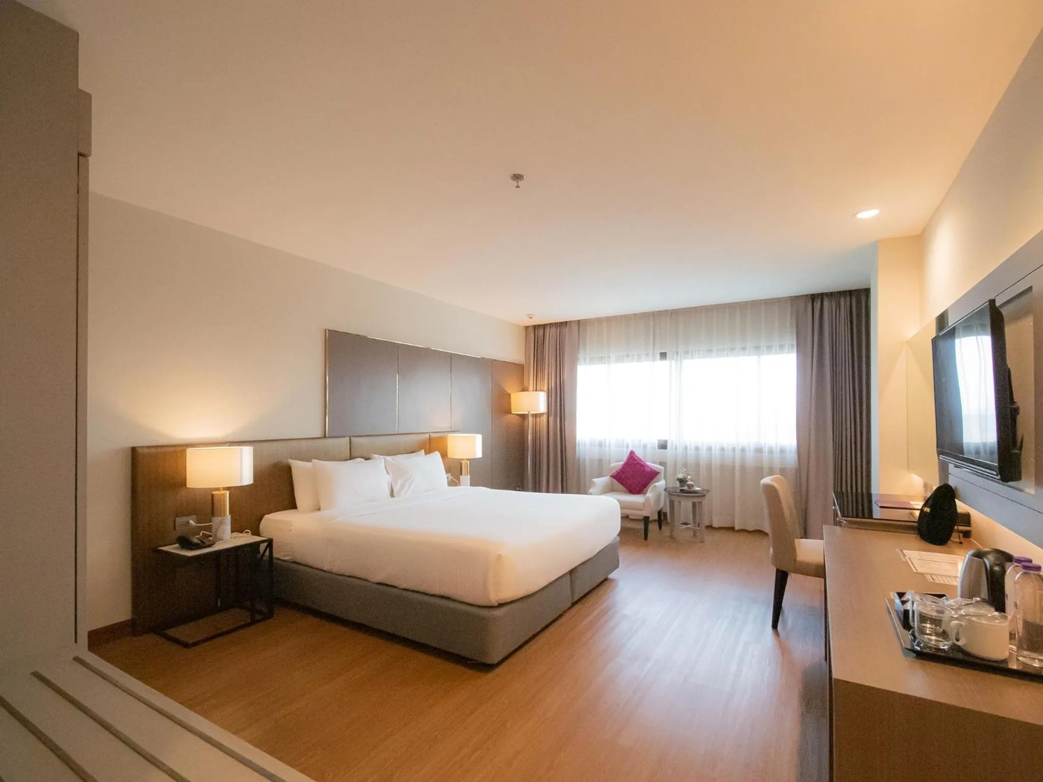 Photo of the whole room, Bed in Fortune River View Hotel Nakhon Phanom