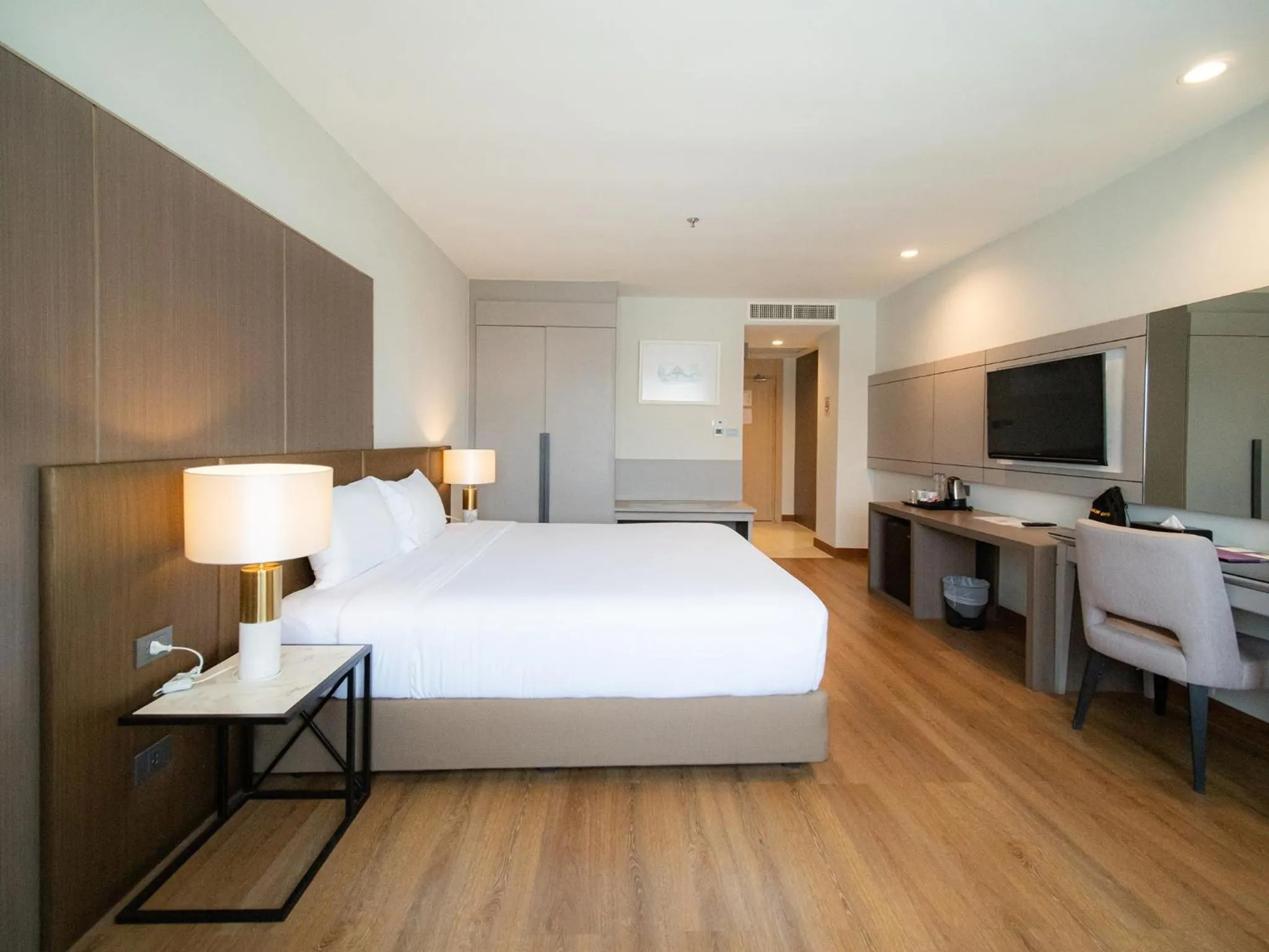 Bed in Fortune River View Hotel Nakhon Phanom