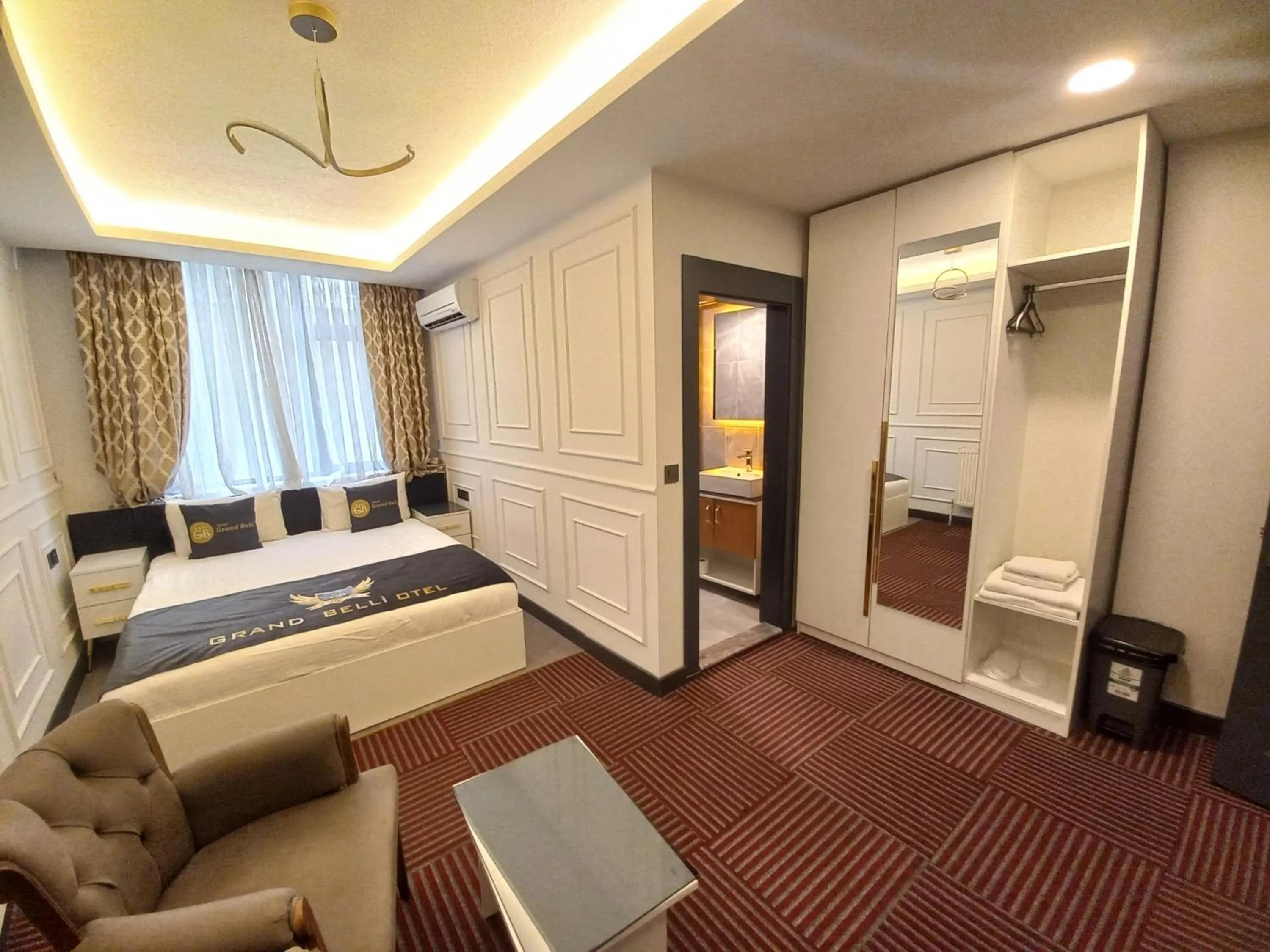 Bed in GRAND BELLİ OTEL