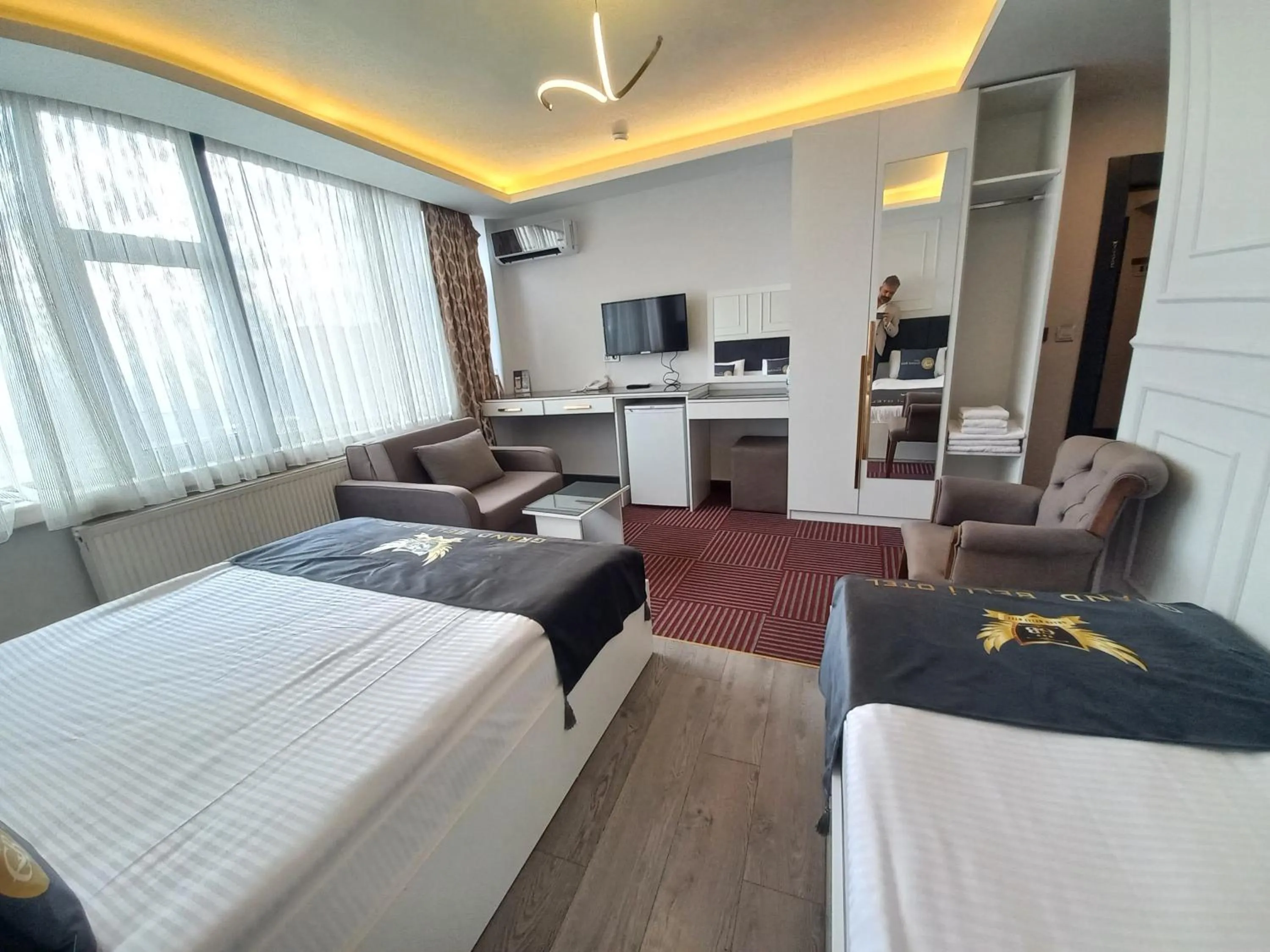 Bed in GRAND BELLİ OTEL