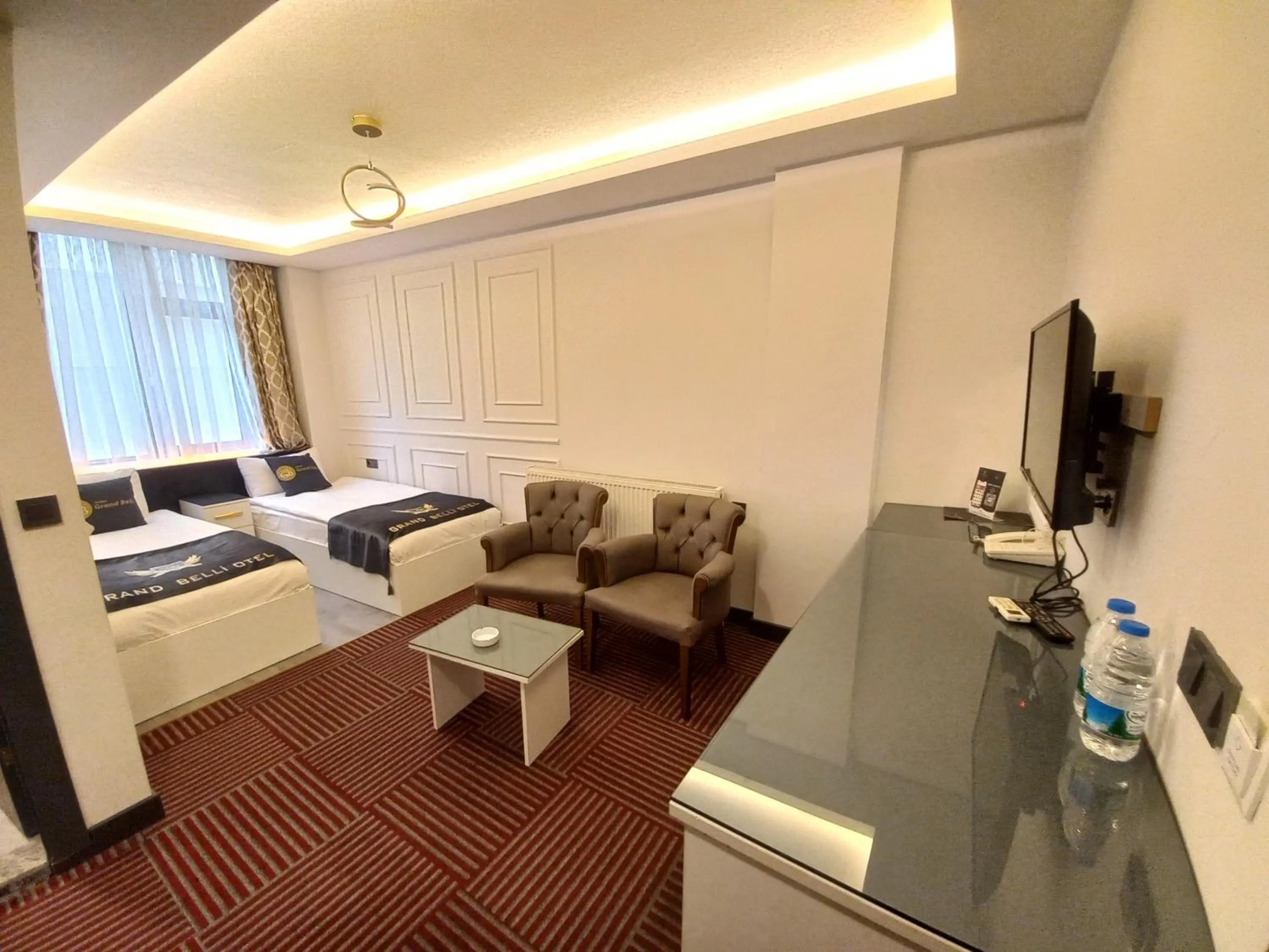 Bed in GRAND BELLİ OTEL