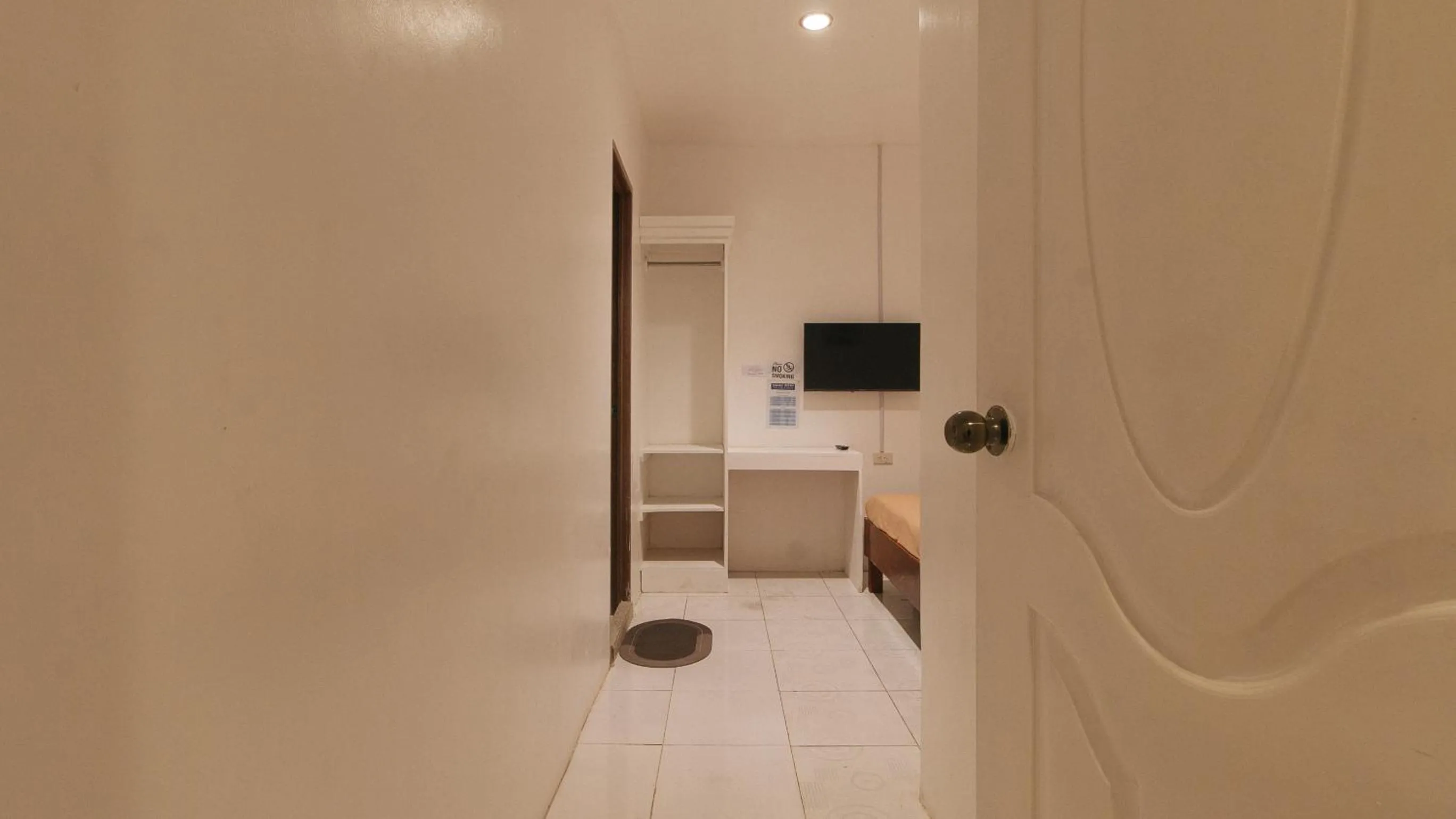 TV and multimedia in Buenas J Hotel and Spa