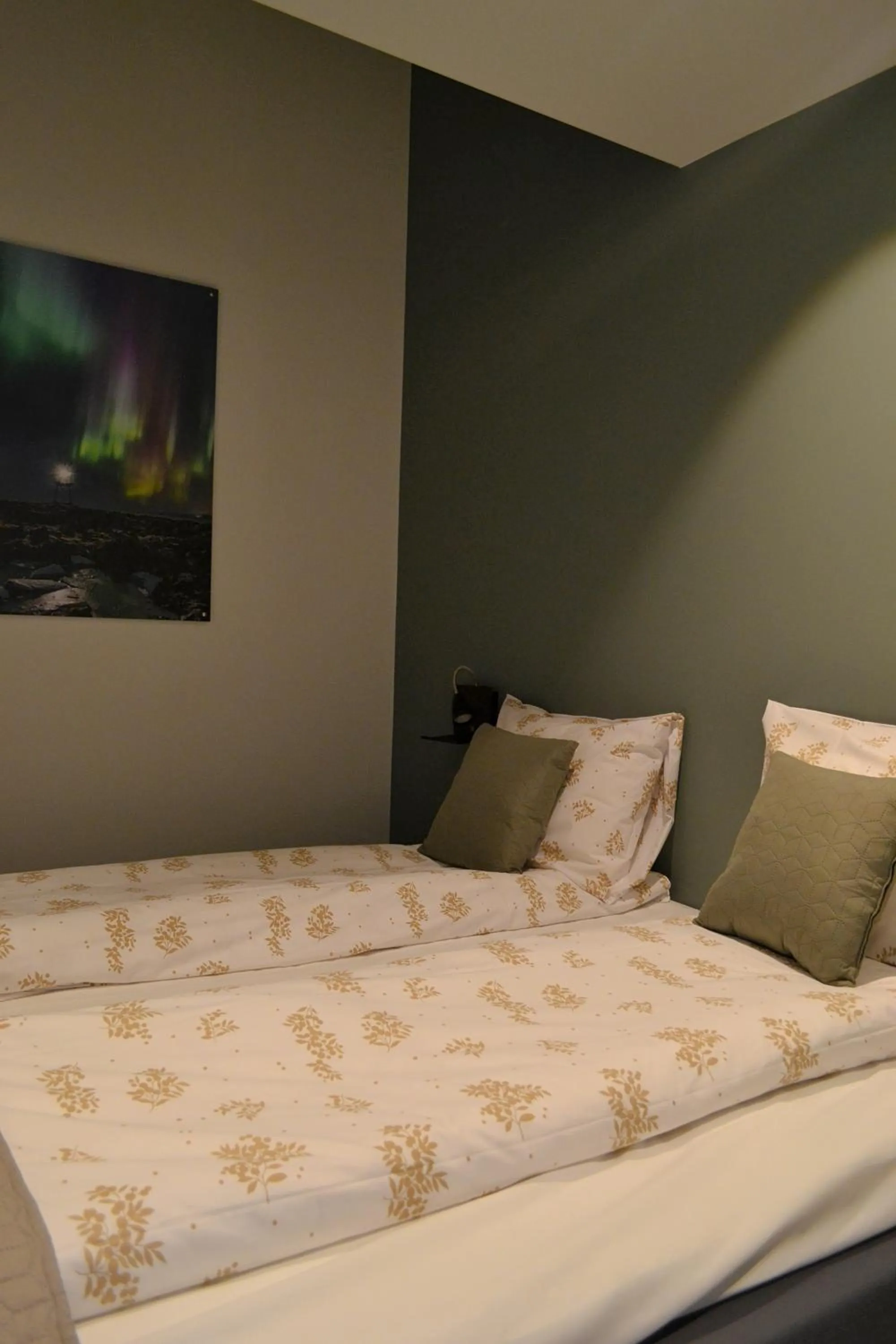 Bed in Andenes Suitehotel